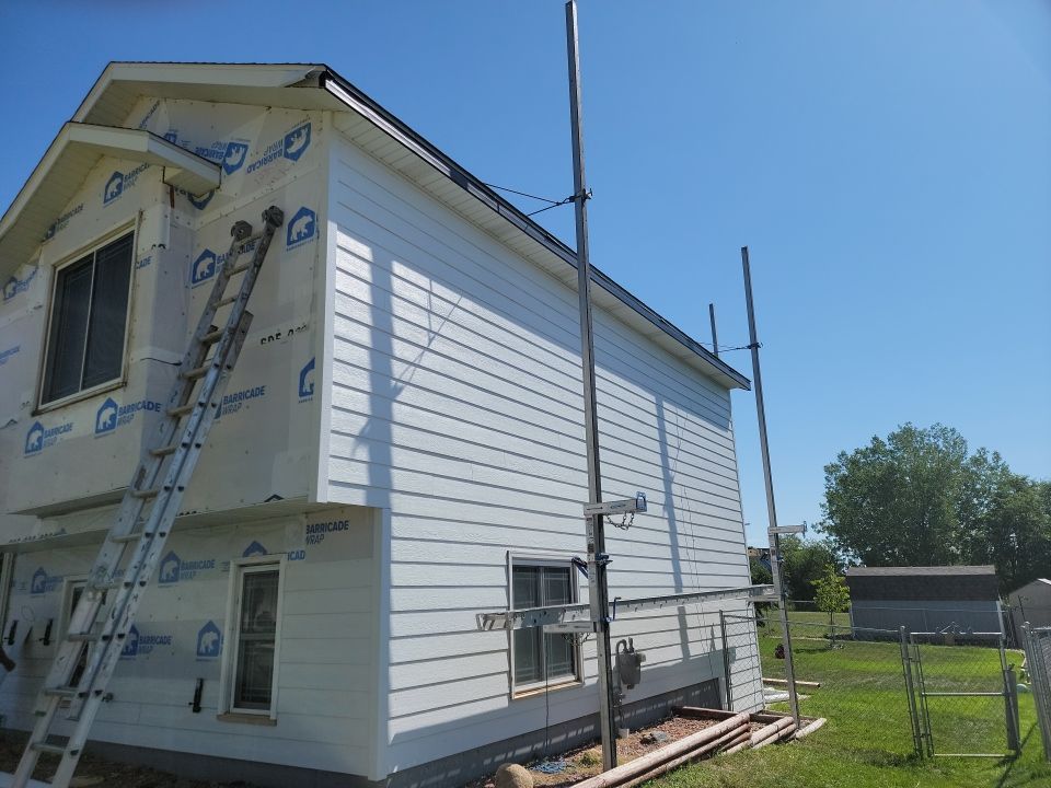 New and Improved Siding by Weather-Tite Exteriors LLC