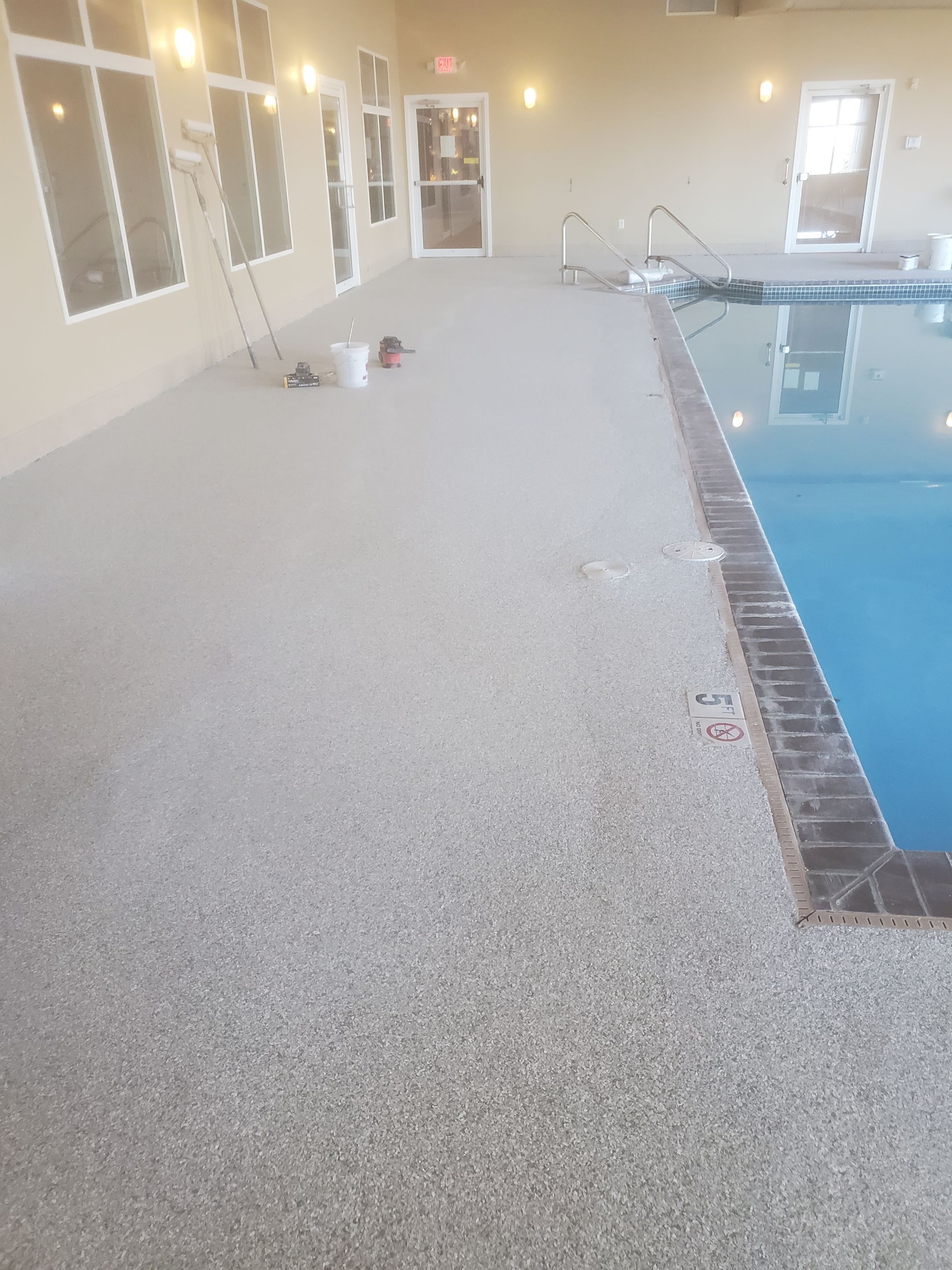 Pool Deck using Mount Everest by Select Painting, Coatings & Garage Cabinets