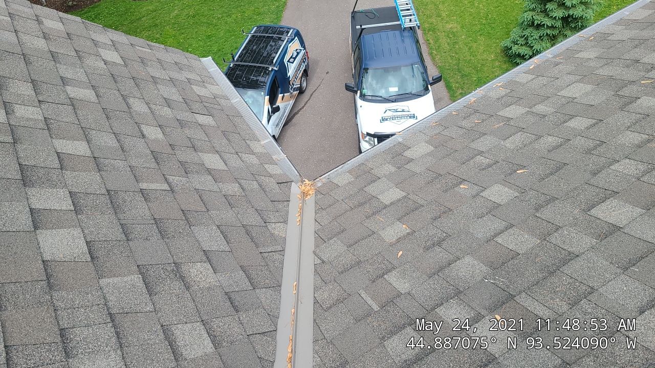 Chanhassen, MN – Roof Replacement with Gutter Guard Upgrade by First Impressions Exteriors