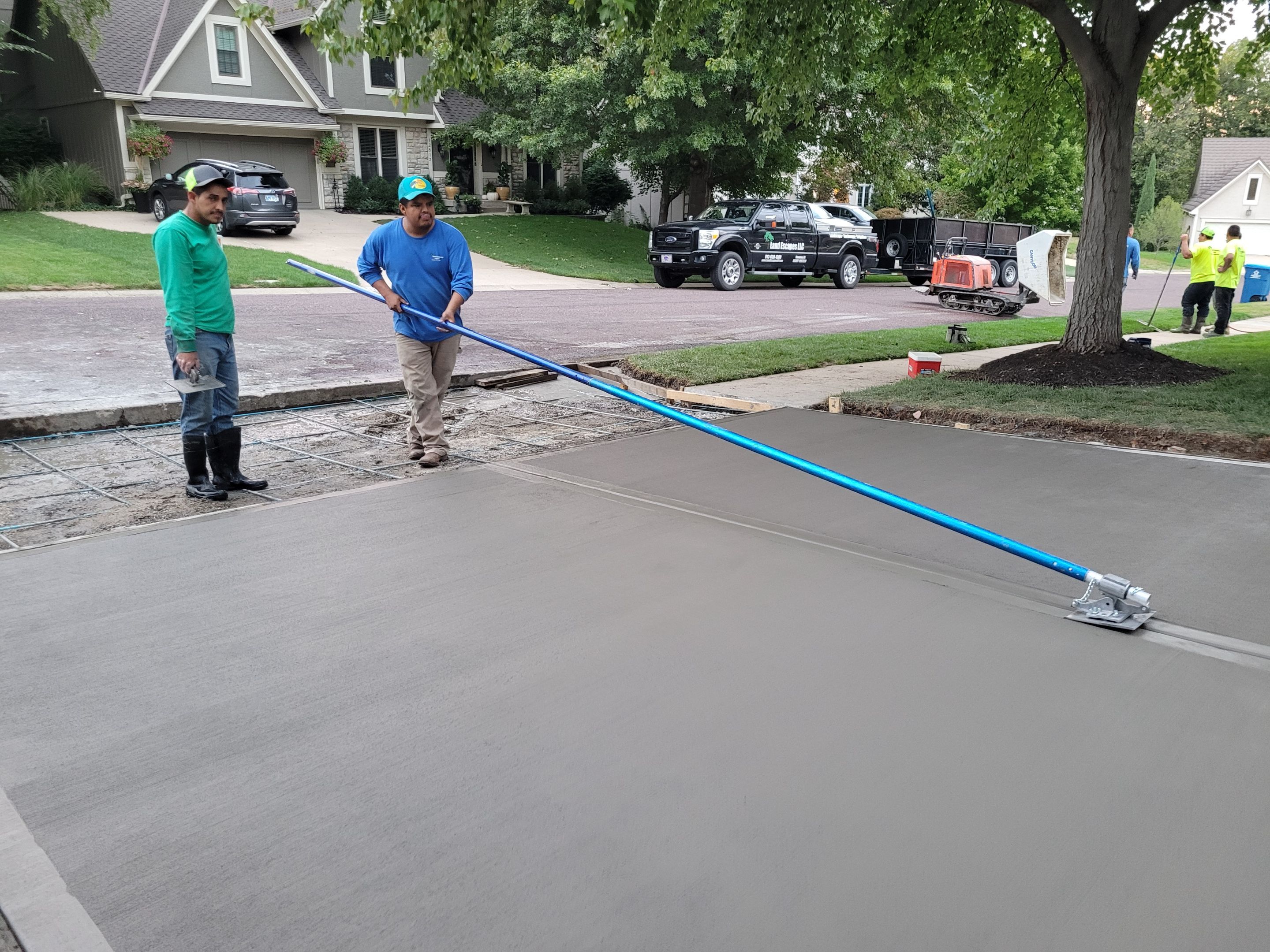 New Driveway and Sidewalk by LAND ESCAPES LLC