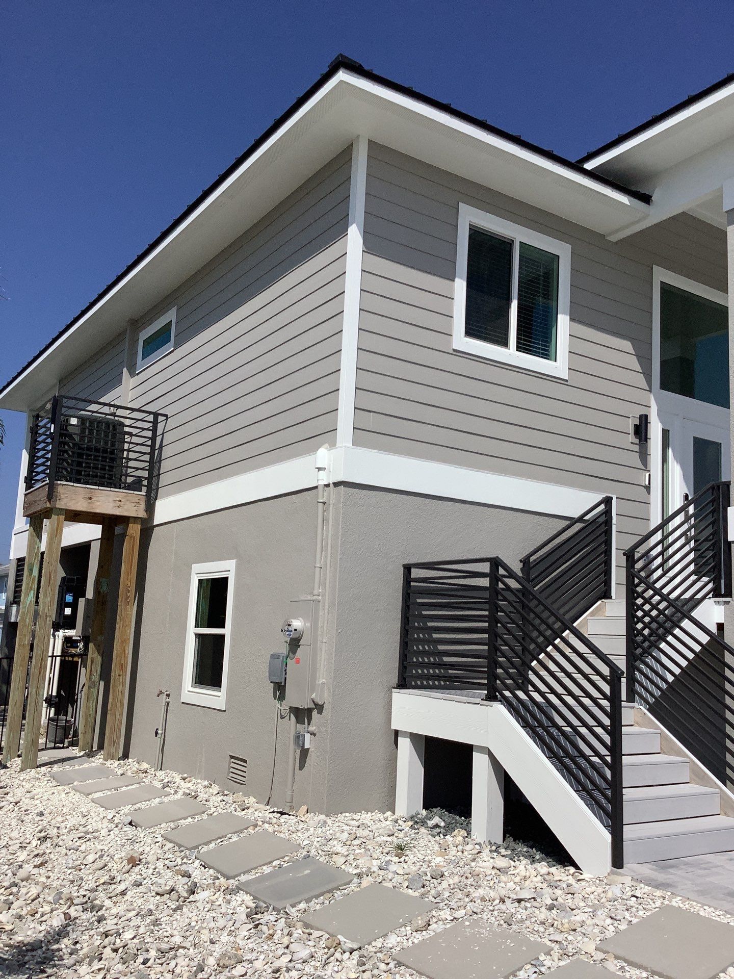 Custom Black Seamless Gutter in Fort Myers Beach FL by Gutter Professors