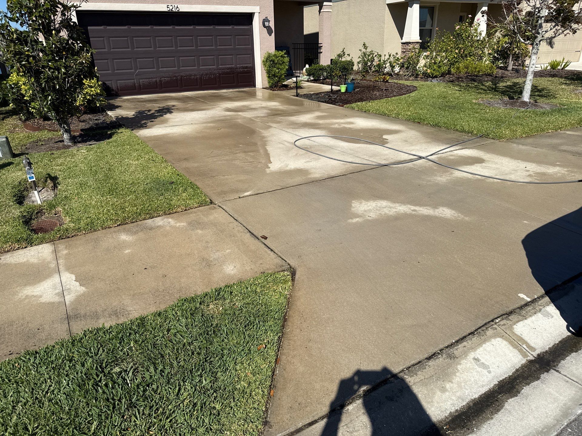 Painted Lanai Floor, Screen Enclosure, and Driveway Cleaning in Trevesta Community, Palmetto, FL by Sunshine AquaWash