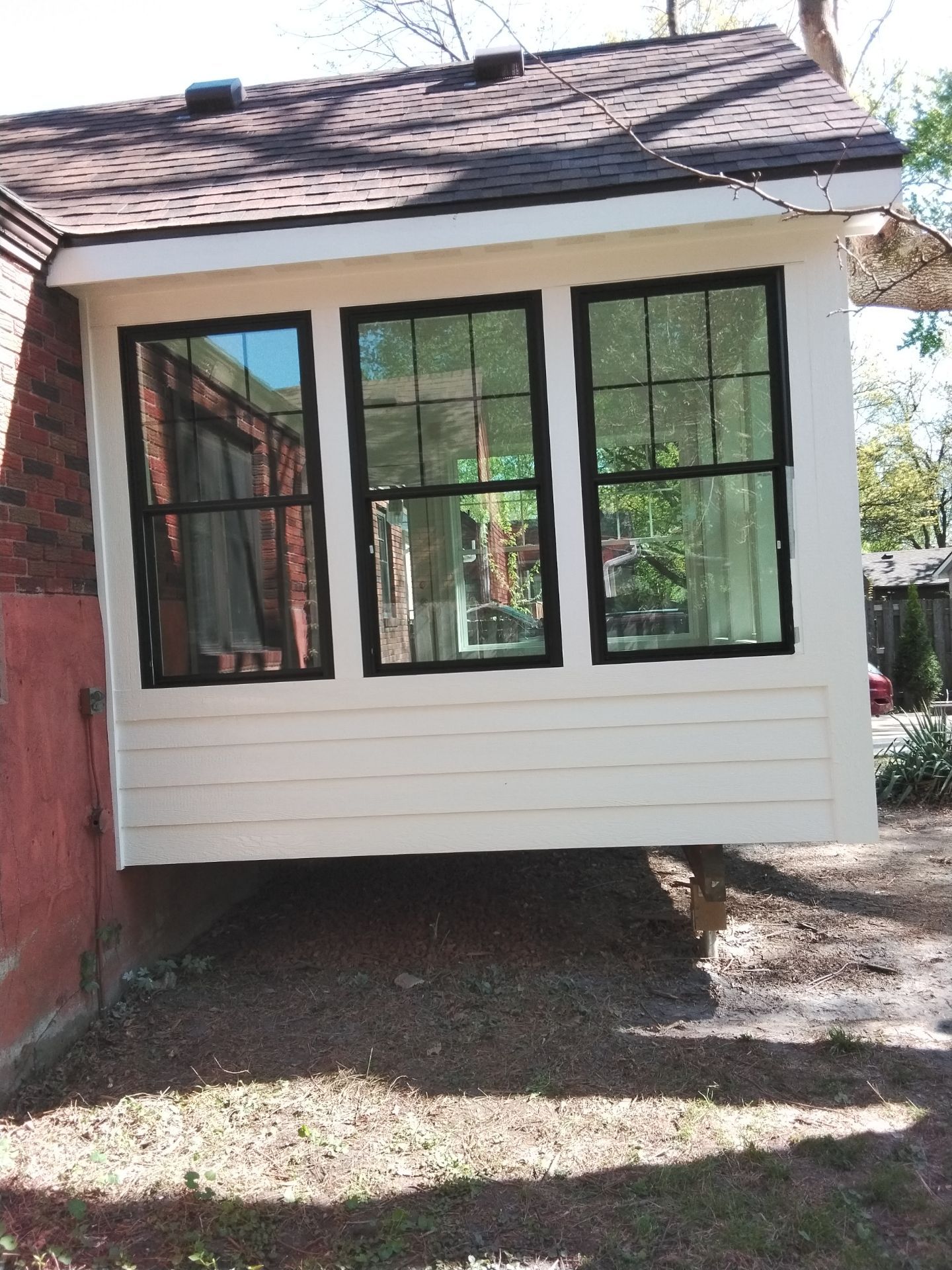 New 4 season room interior & exterior painting by Midwest Paint LLC
