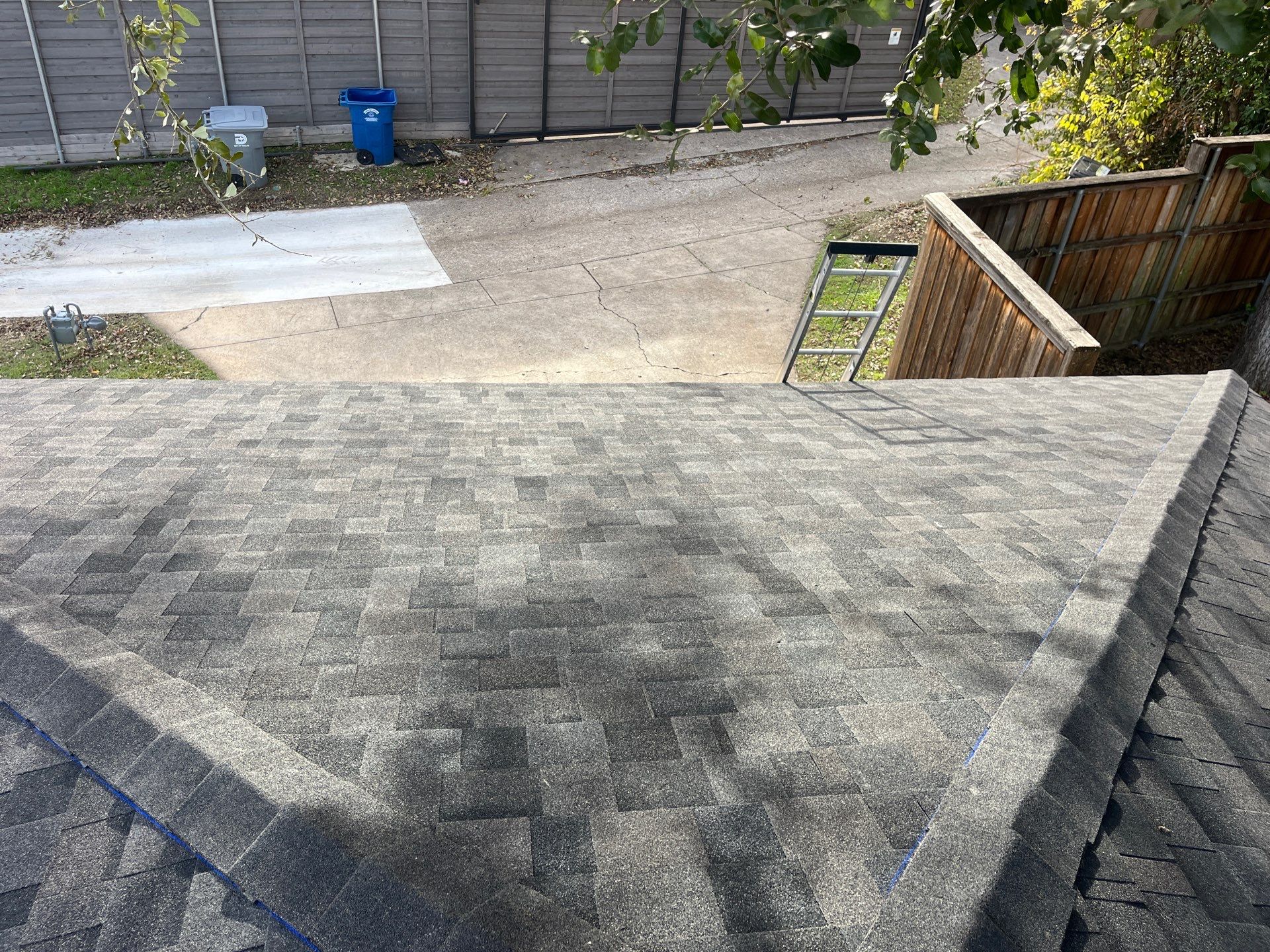 IKO Brownstone- White Brick  by Tejas Roofworks + Restoration