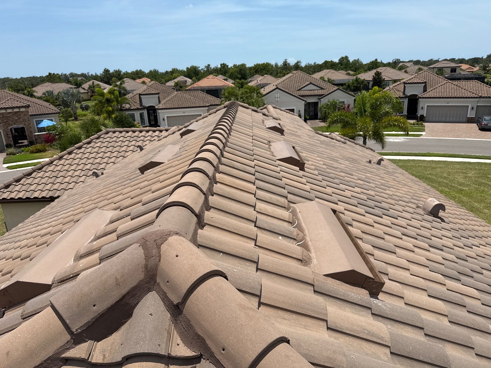 Concrete Tile Roof, Paver Driveway & Lanai Cleaning – Artisan Lakes Esplanade, Palmetto, FL by Sunshine AquaWash