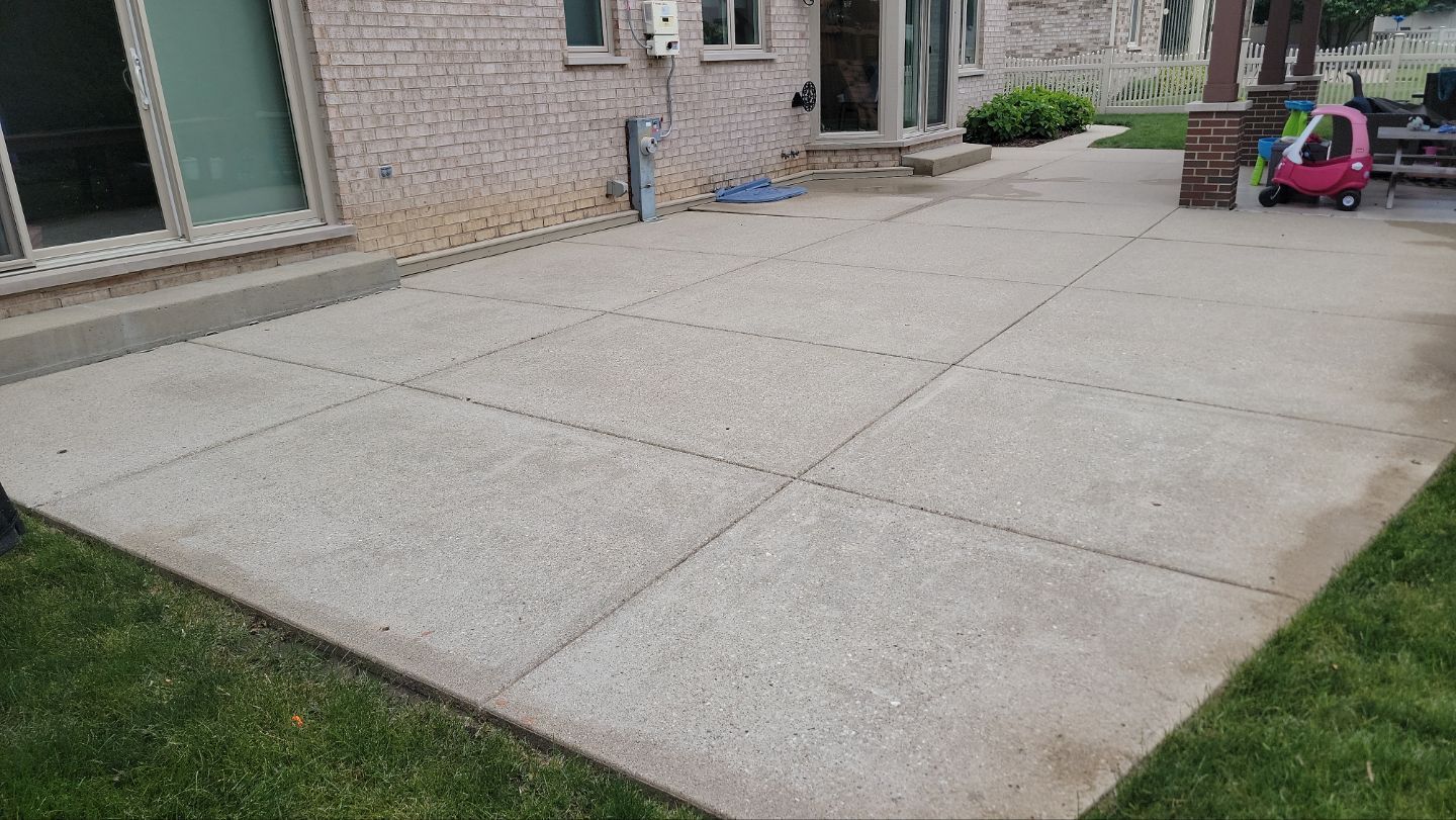 concrete power washing Algaecide, soft wash soap by Northern Power Washing LLC.