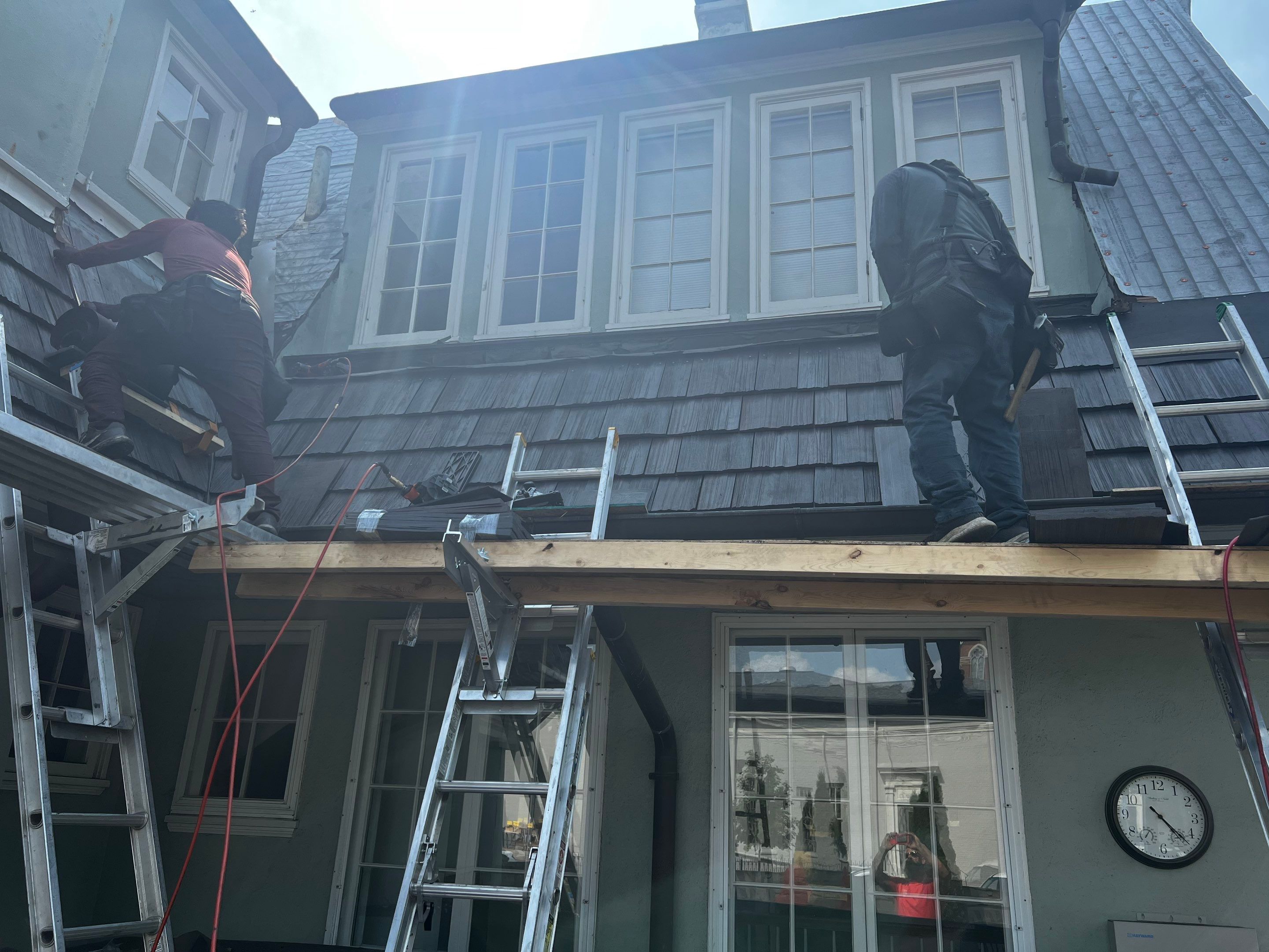 Slate removal/Cedar Shake replacement by Storm Contracting 