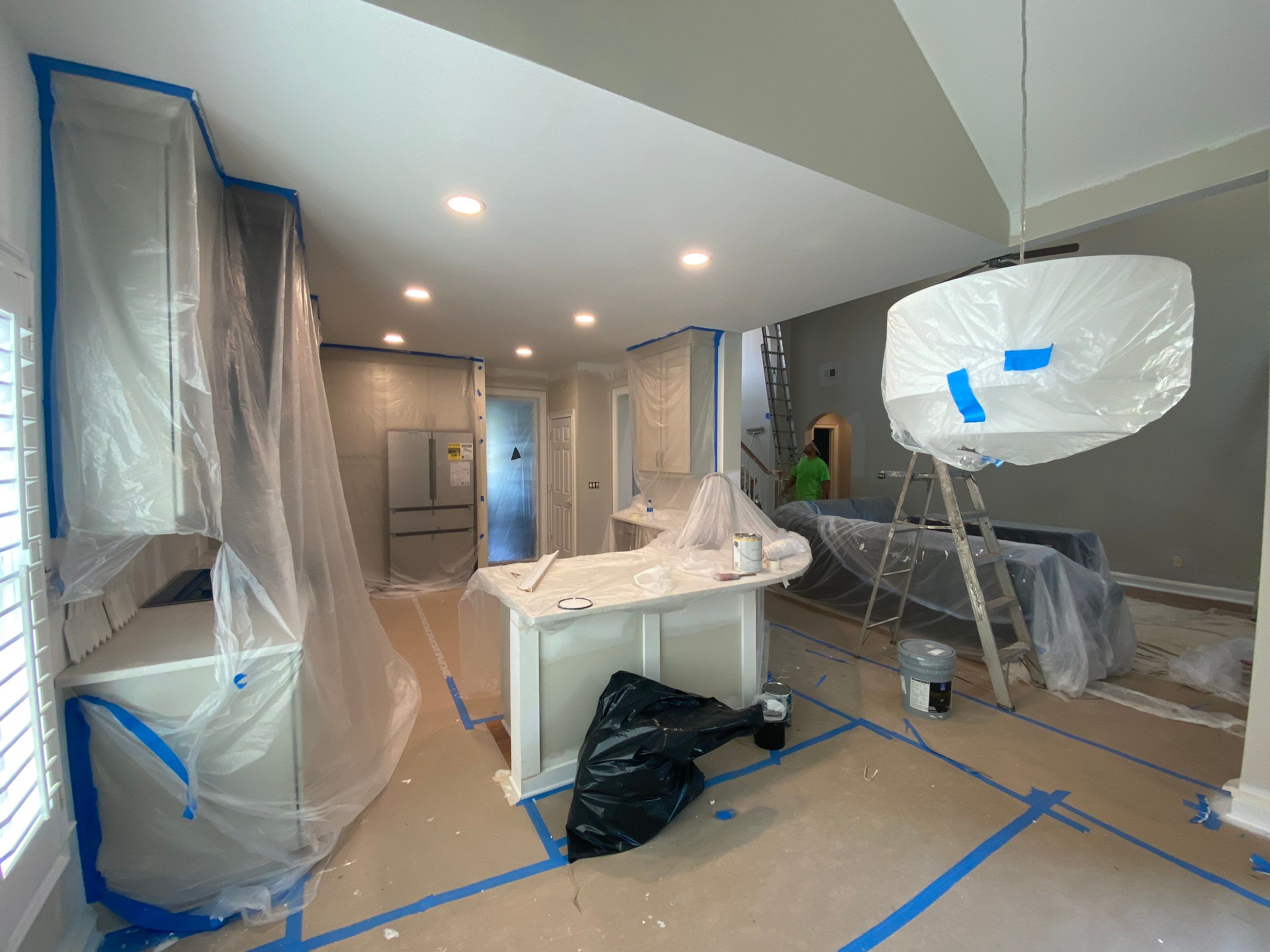 Modern Kitchen Remodeling with Quartz Island and Custom Vent Hood in Woodstock by Swift Home Renovations