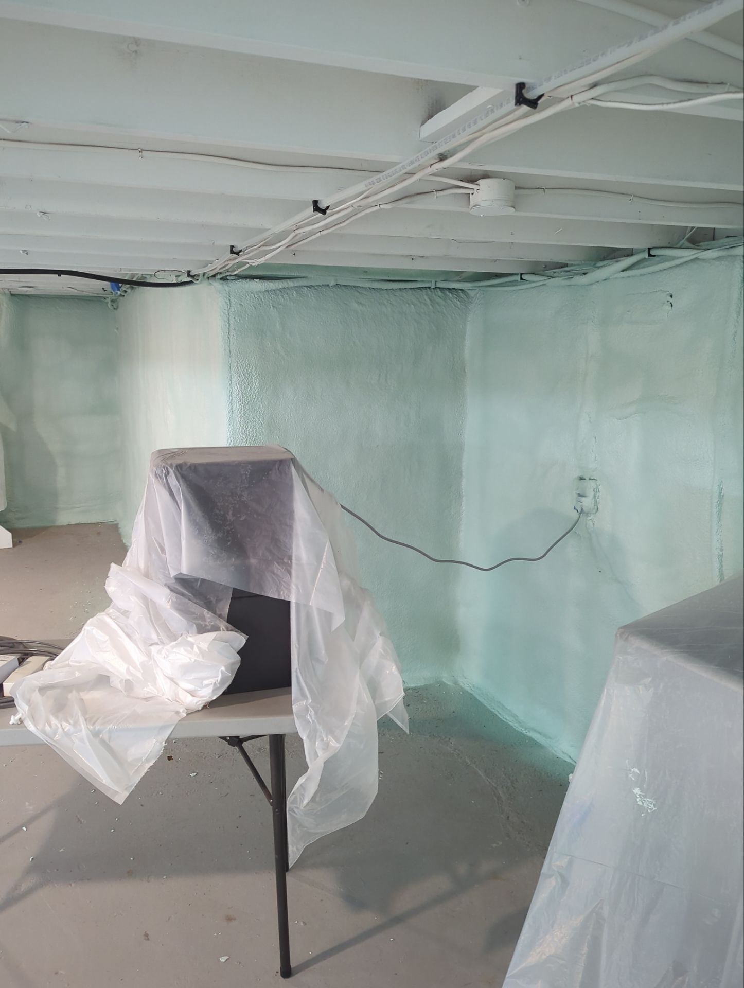 Basement Exterior Walls using Closed Cell Spray Foam by NYS Foam & Energy