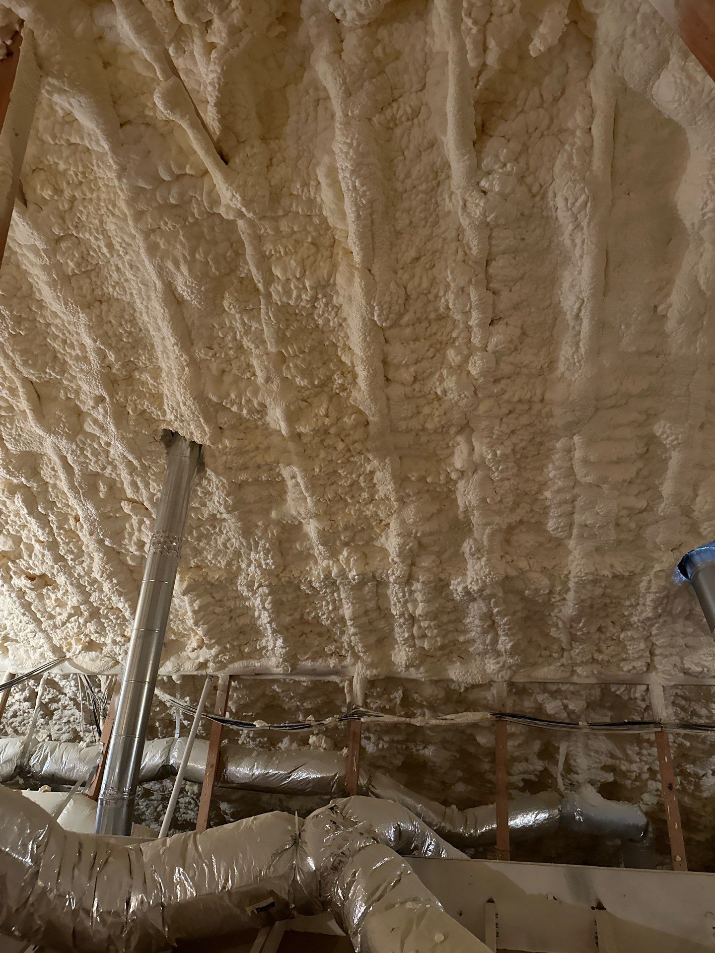 Spray foam insulation removal & re spray by Apex Insulation Solutions