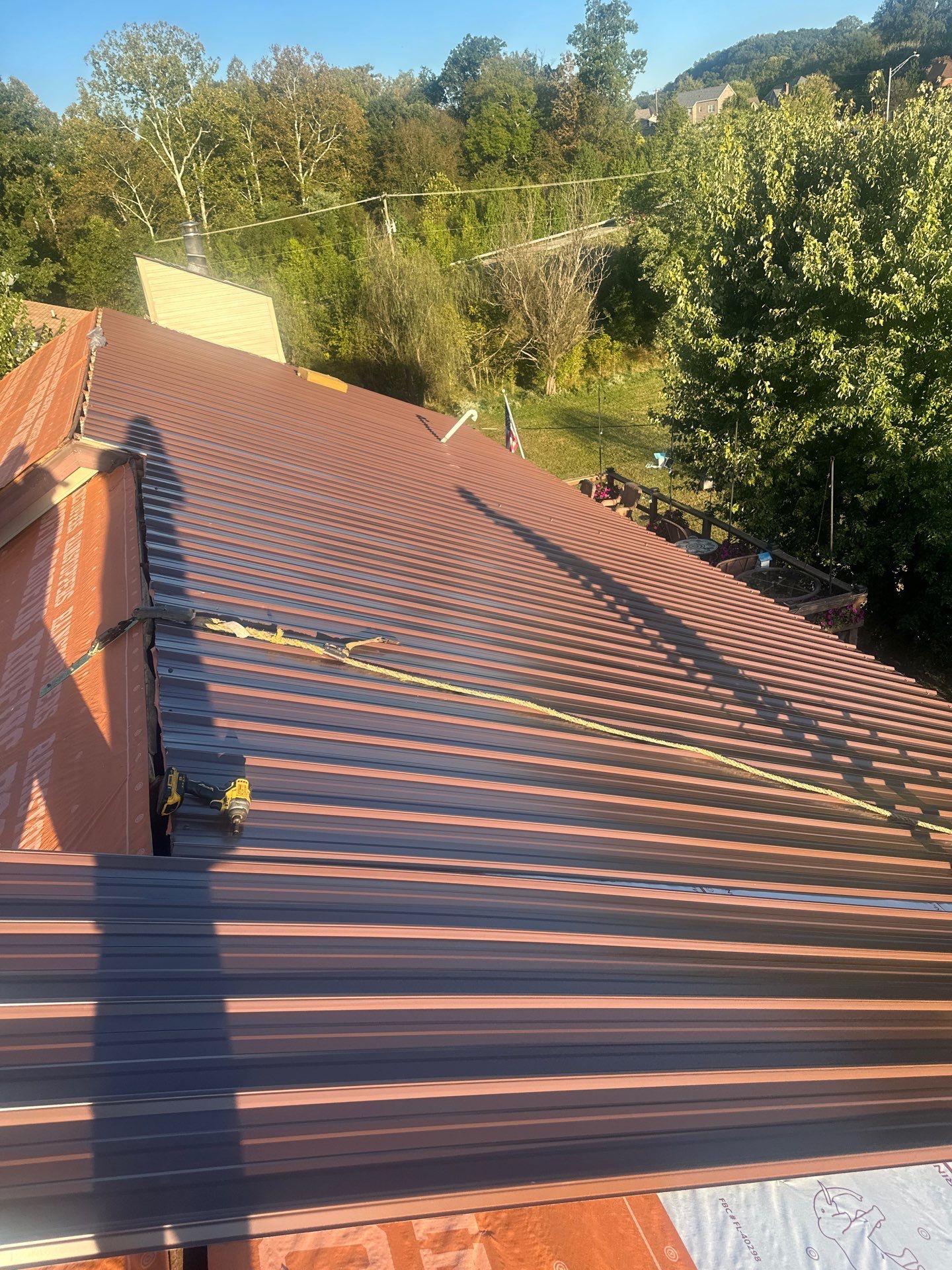 Residential Roofing Installation using Metal by Rainstoppers Roofing