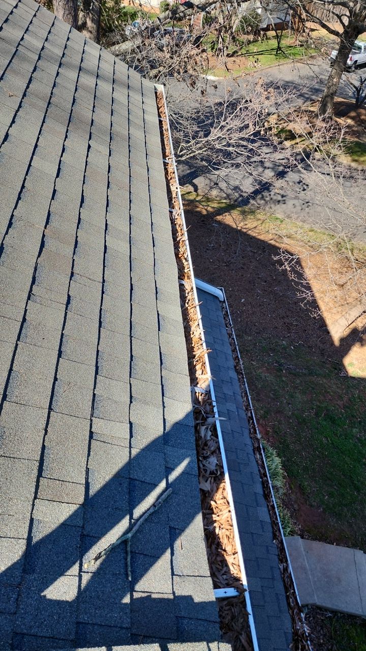 Gutter Cleaning using water by Power Wash Masters LLC