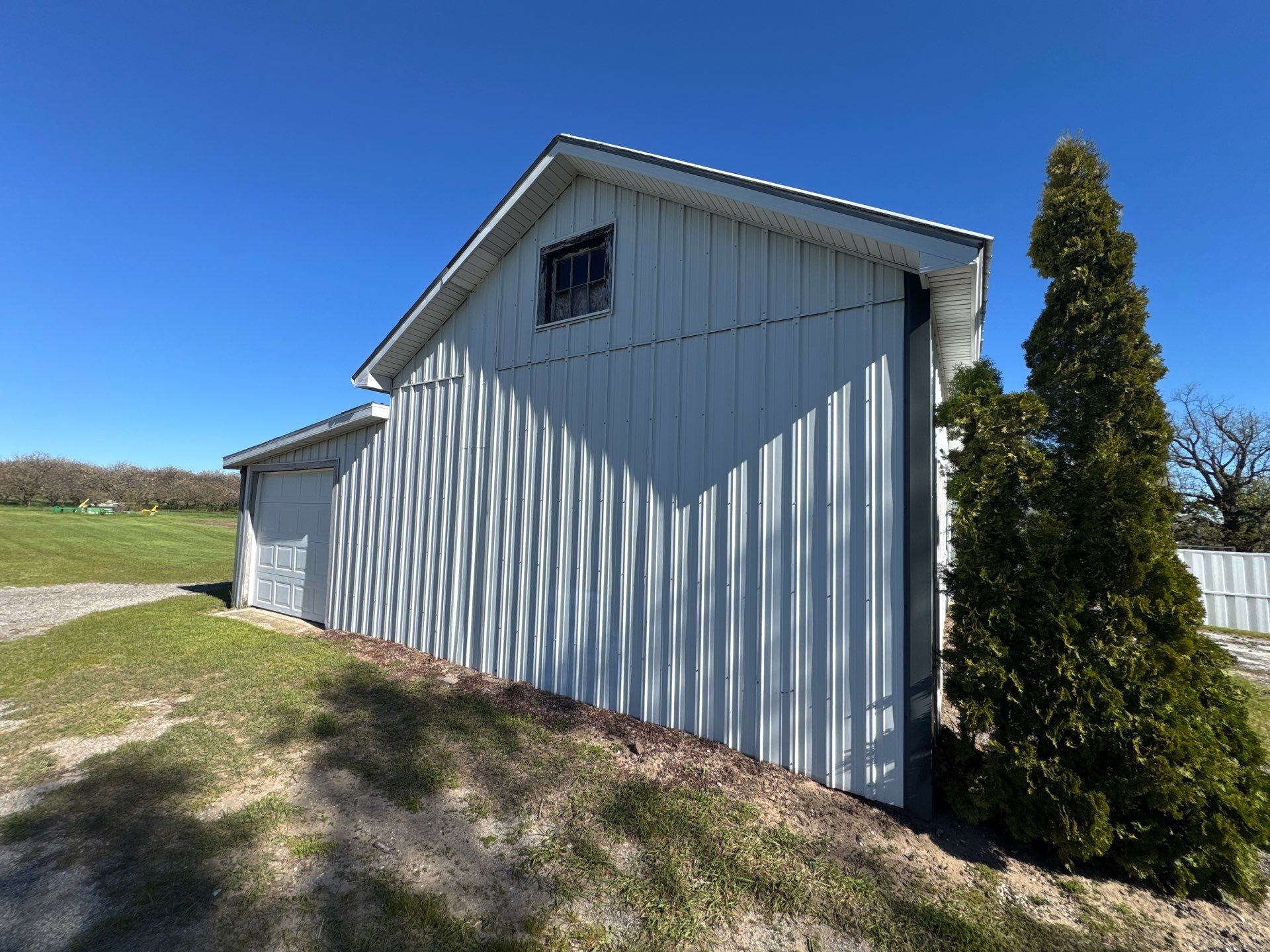 Exterior Painting and Trim Restoration for Mears Metal Buildings by Gordon Painting