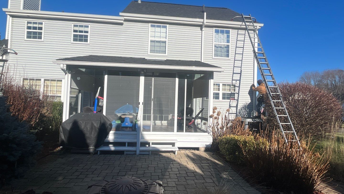 Gutter Installation using White gutters by A Plus Exterior