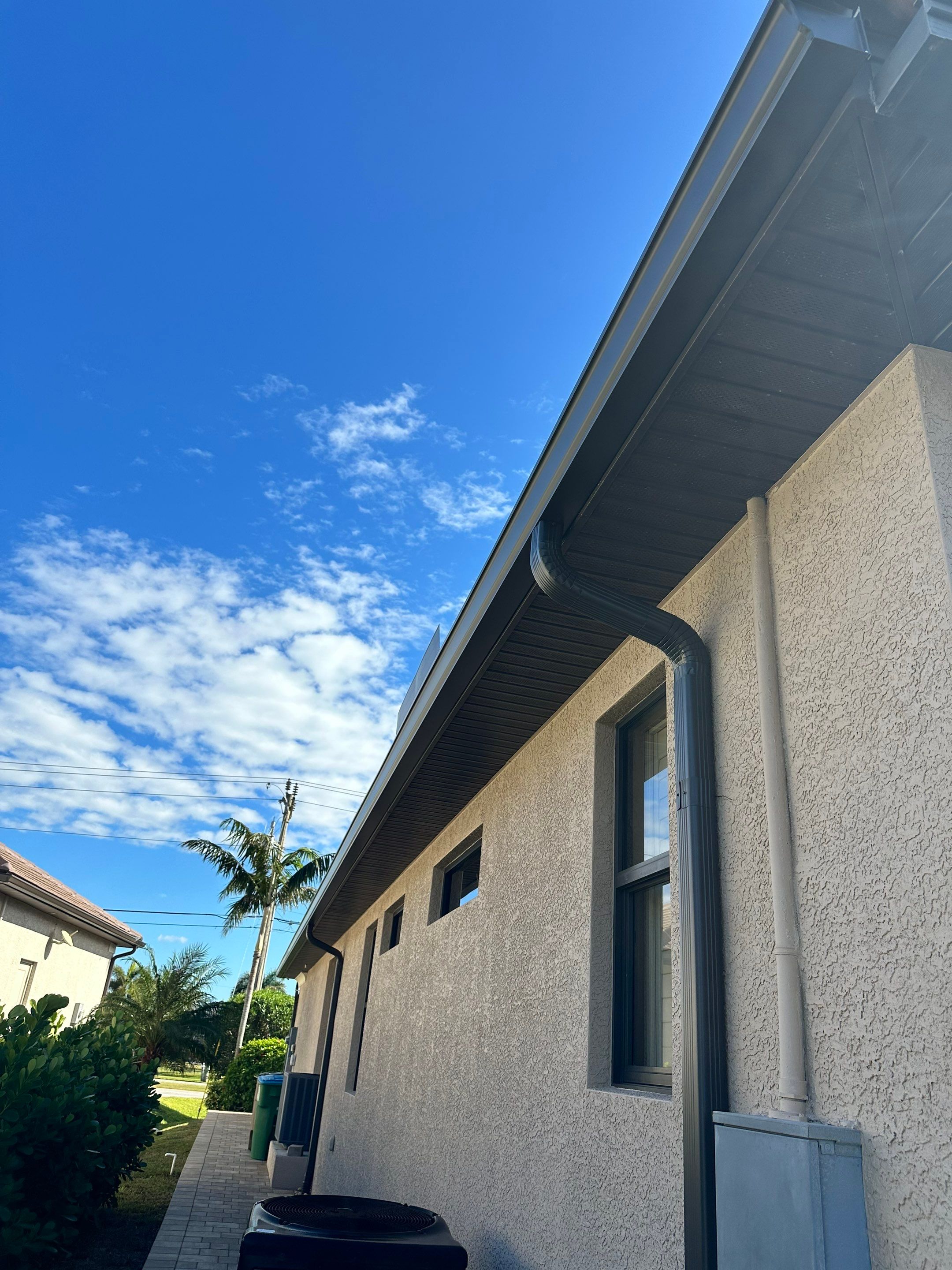 Bronze Downspout Installation in Cape Coral FL by Gutter Professors