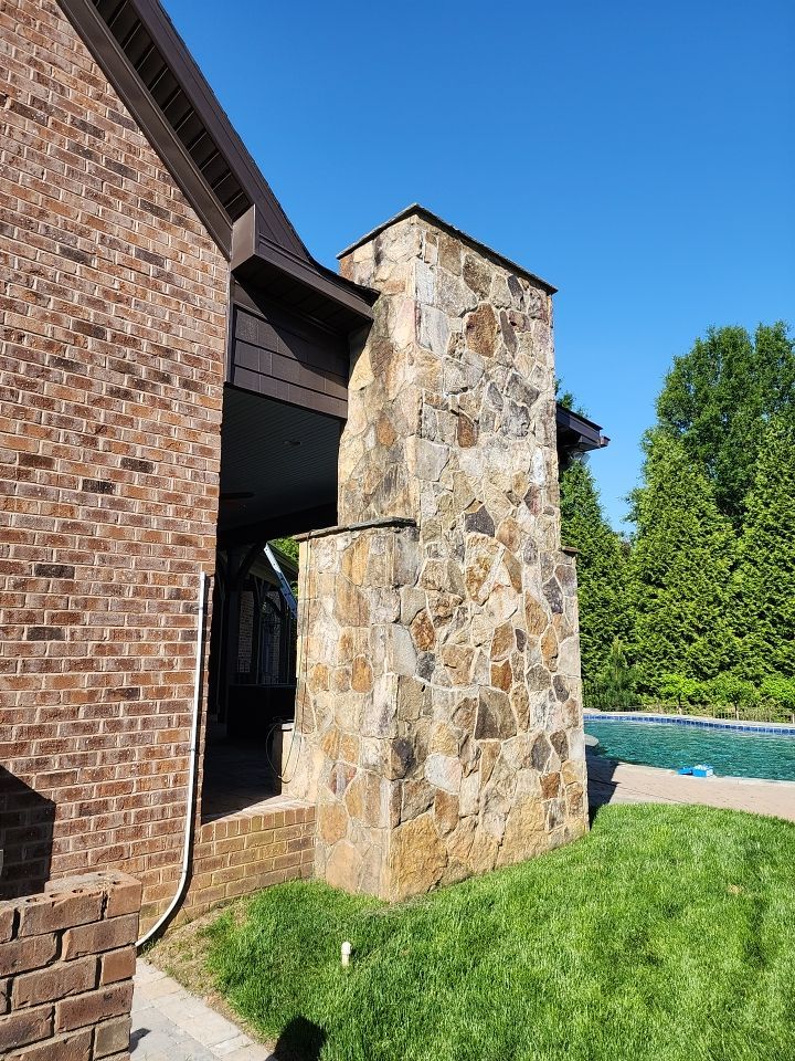 House Wash using cleaner by Power Wash Masters LLC