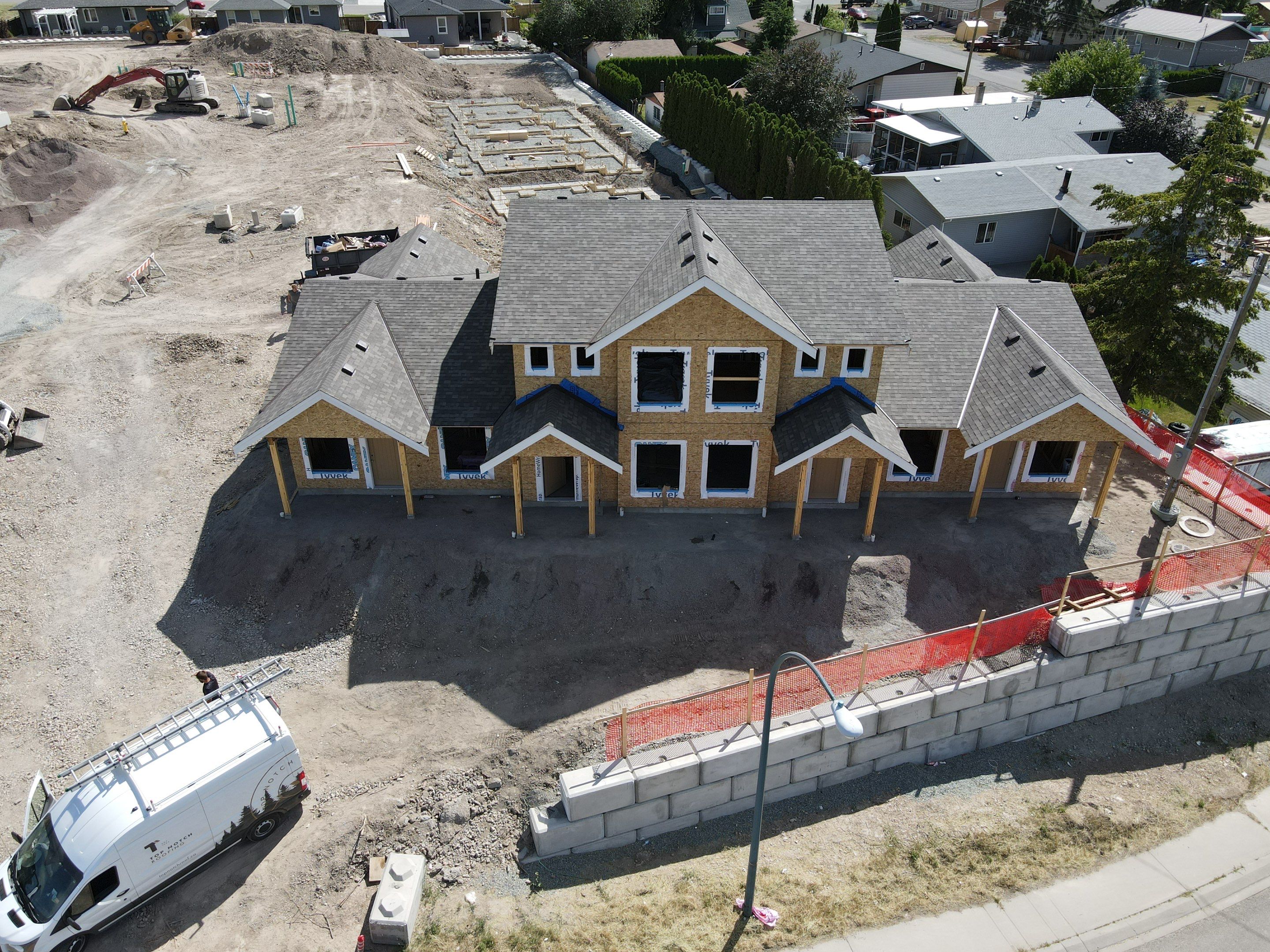 Residential Roofing Installation using OC Oakridge shingles by Top Notch Roofing Inc