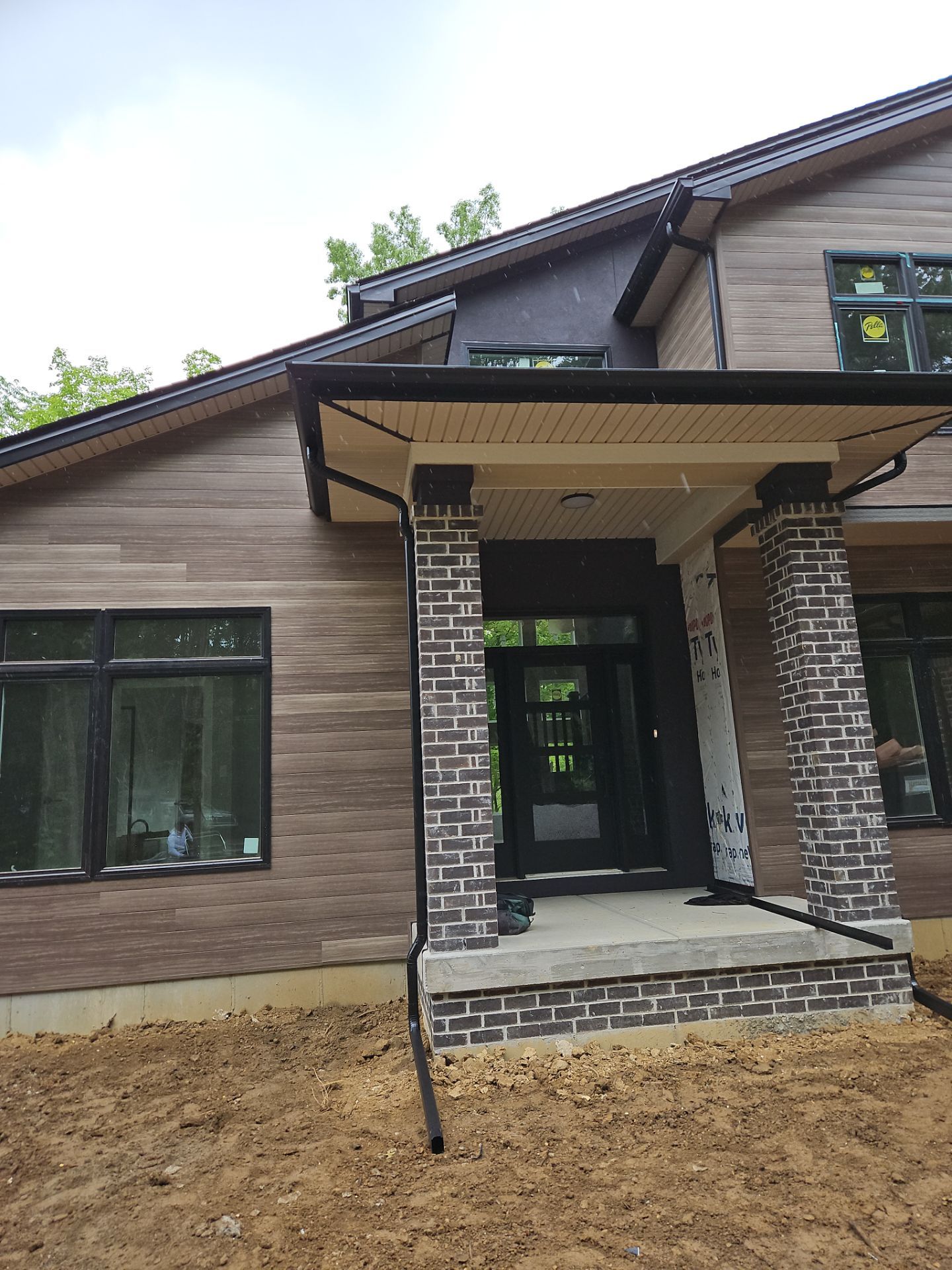 Gutter Installation using 5" Seamless Gutters and Downspouts by RoofX 