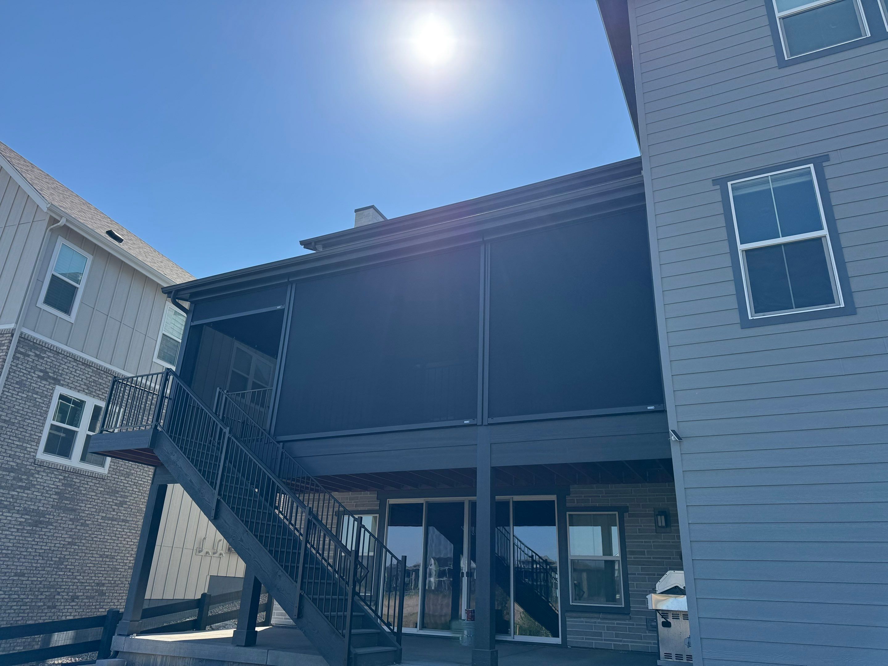 Custom Motorized Screen Installation for Elevated Deck in Castle Pines by Outdoor Solutions Colorado