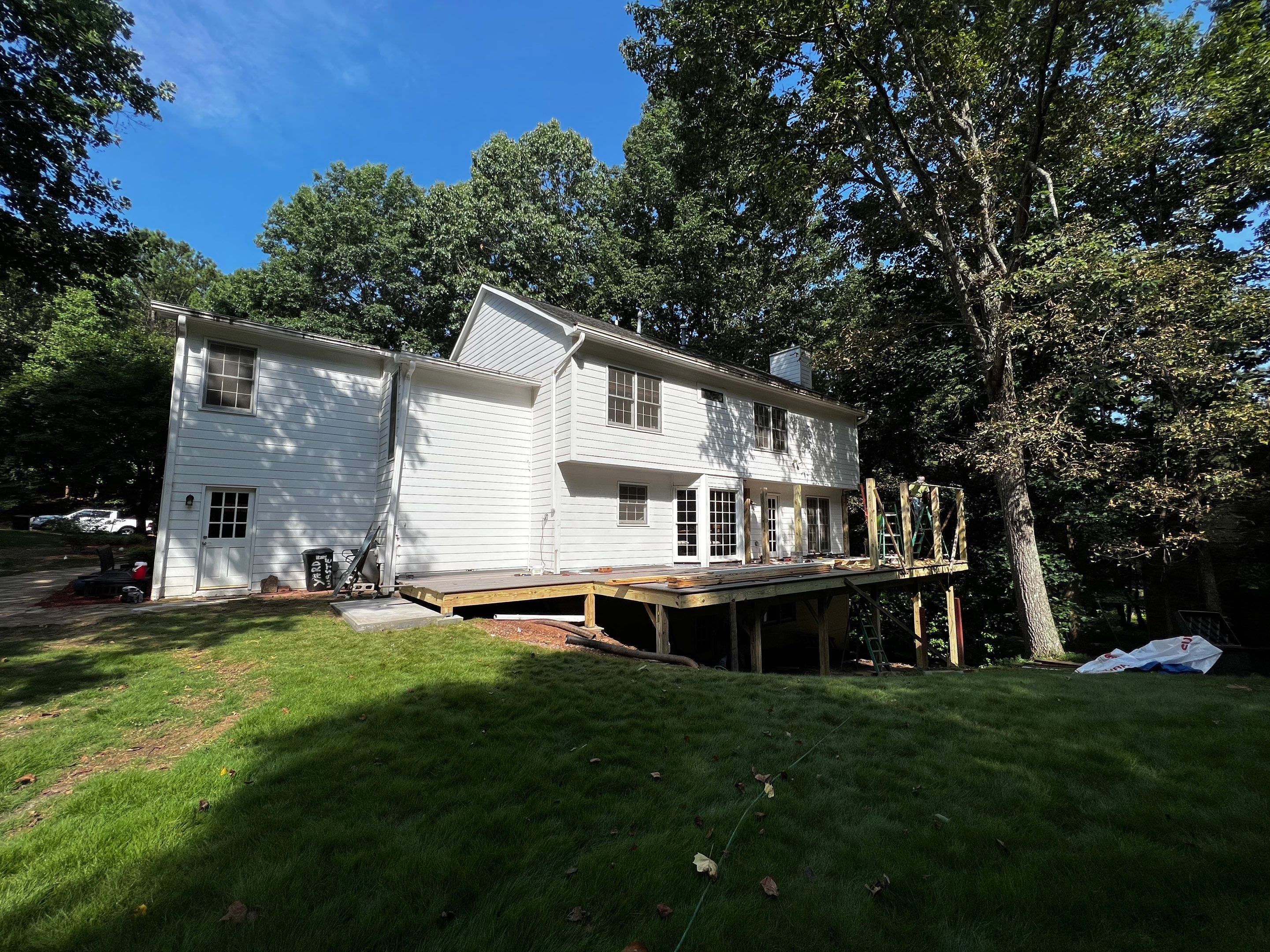 Elevated Composite Deck and Screened Porch Construction in Duluth by Swift Home Renovations 