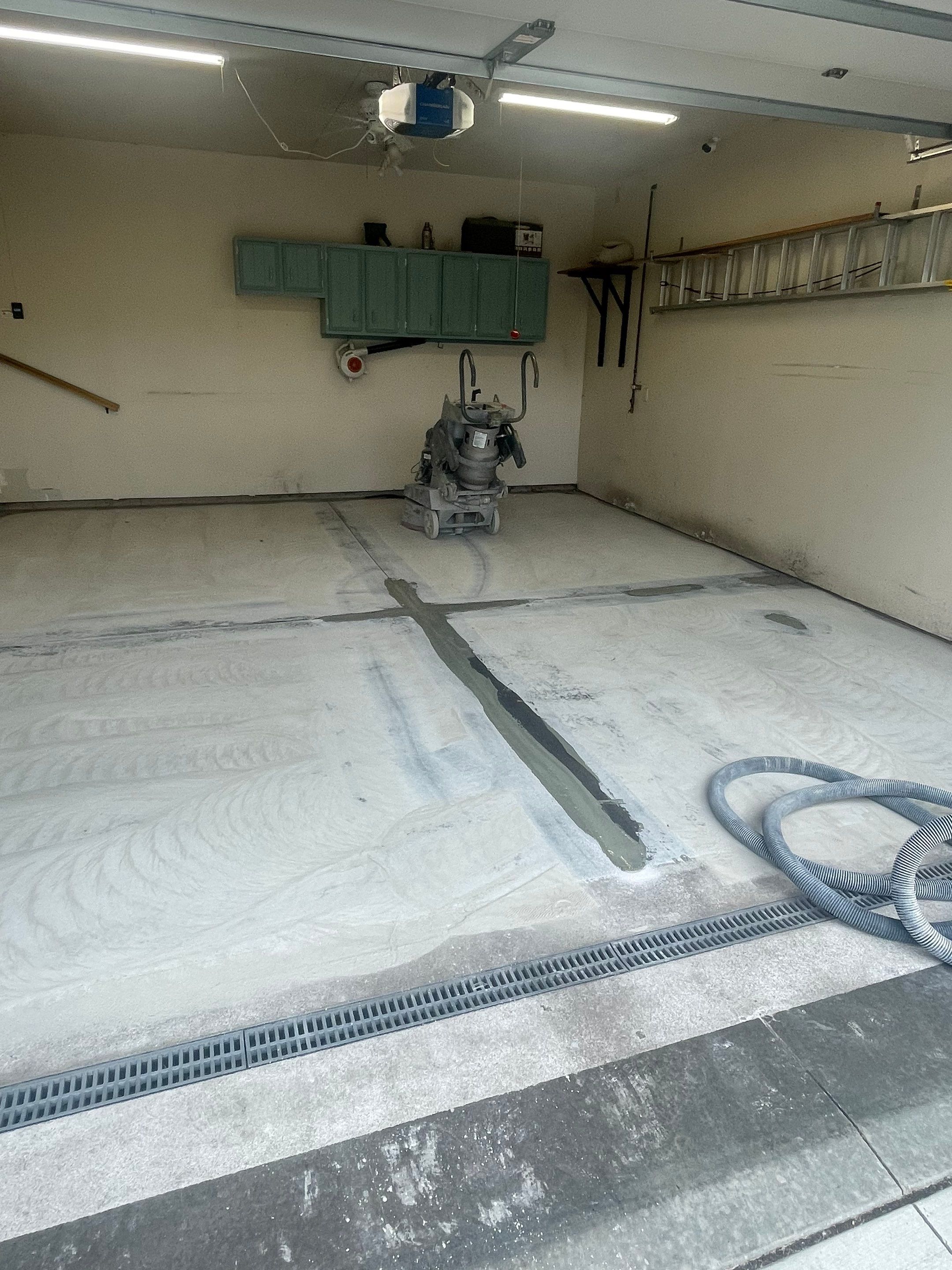 Multi-Stall Garage Floor Coating Installation in Sioux Falls by Select Painting, Coatings & Garage Cabinets