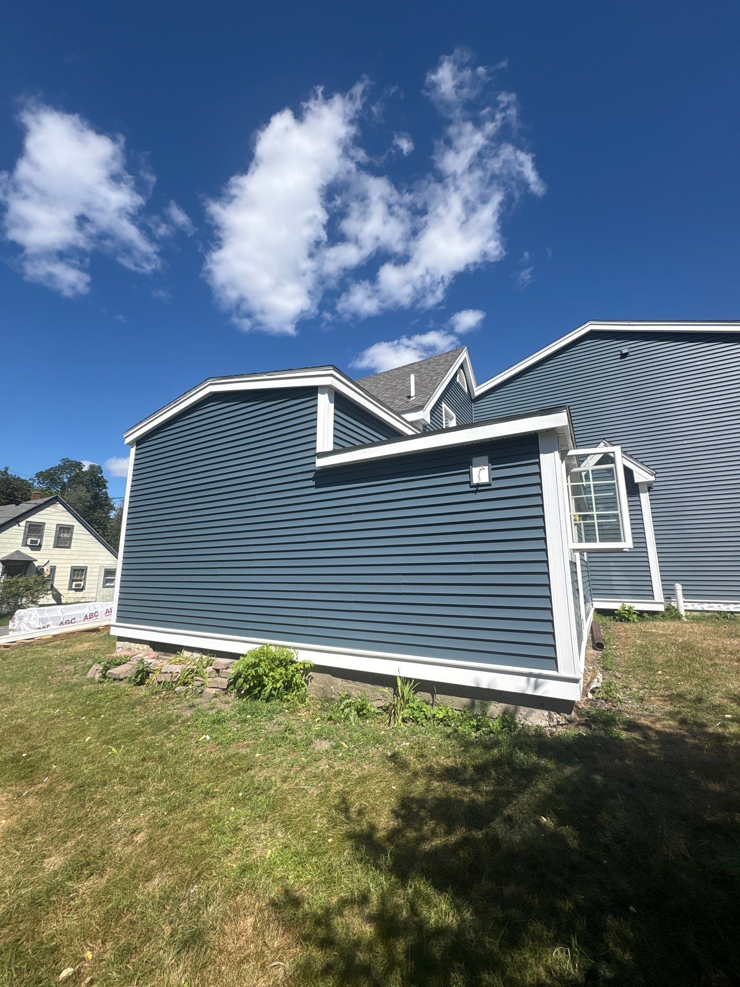 Premium Mixed-Material Siding Installation in North Billerica, MA by Mighty Dog Roofing of Greater Middlesex County