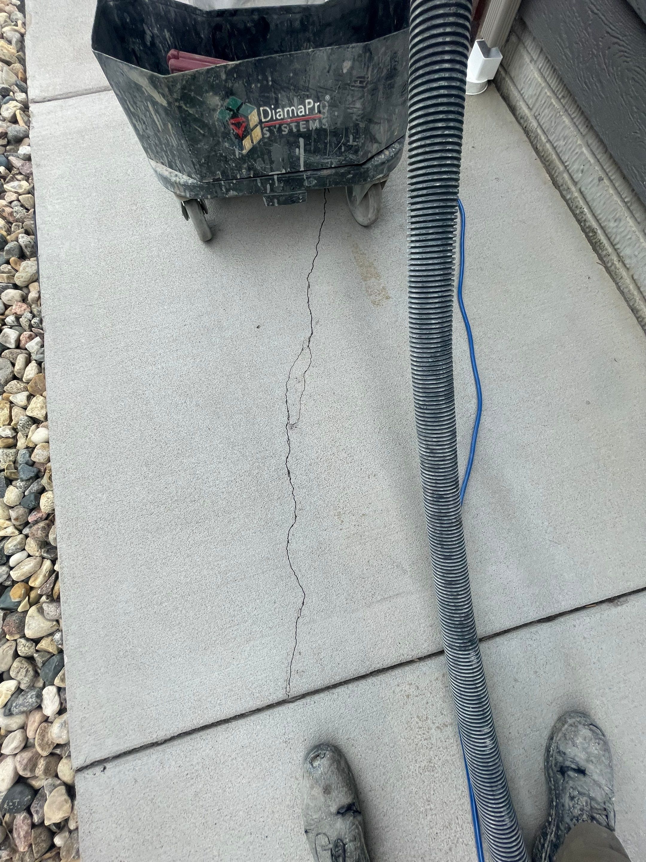 Custom Concrete Coating for Sioux Falls Patio and Front Walkway by Select Painting, Coatings & Garage Cabinets