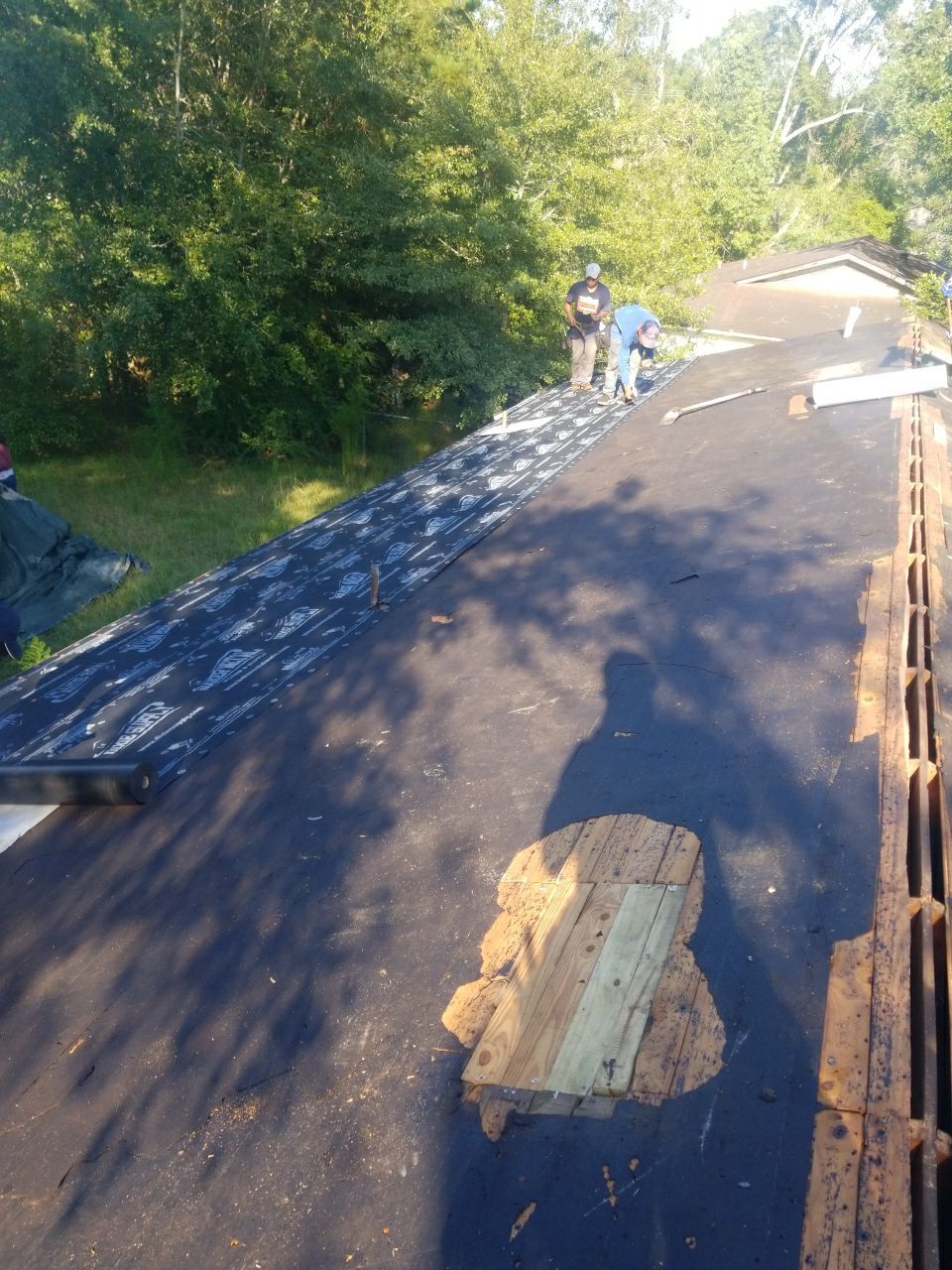 Residential Roofing Installation using Metal roofing by American Roofing & Construction LLC