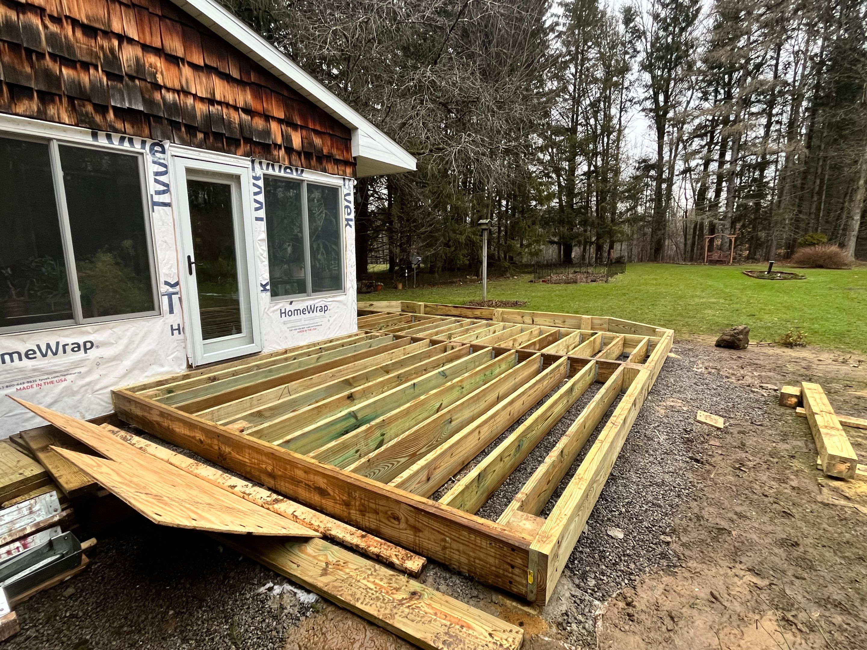 Deck and Stamped Concrete by Ivy Lea Construction