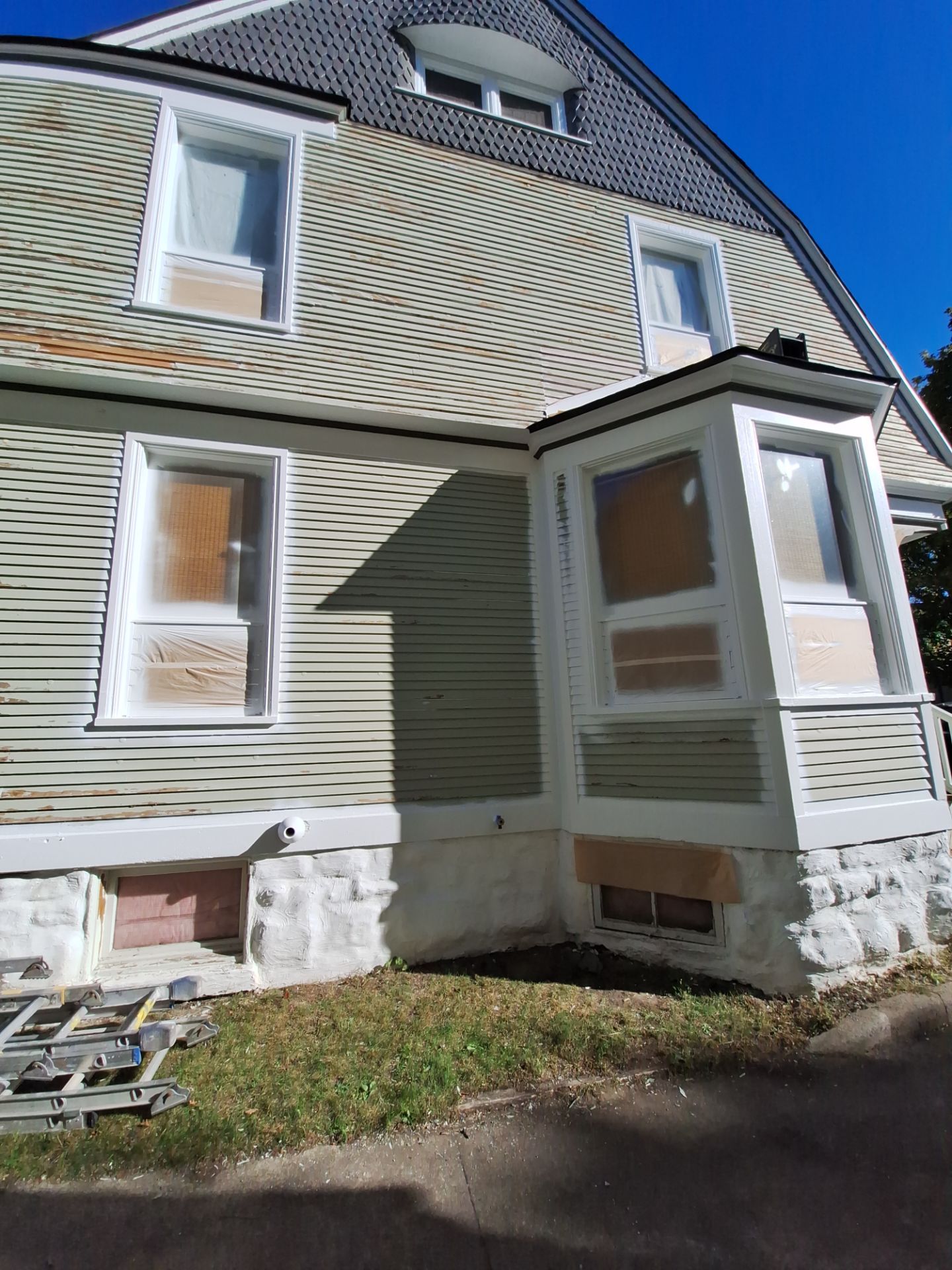 Exterior Home & Porch Refresh in Grand Haven, MI by Gordon Painting