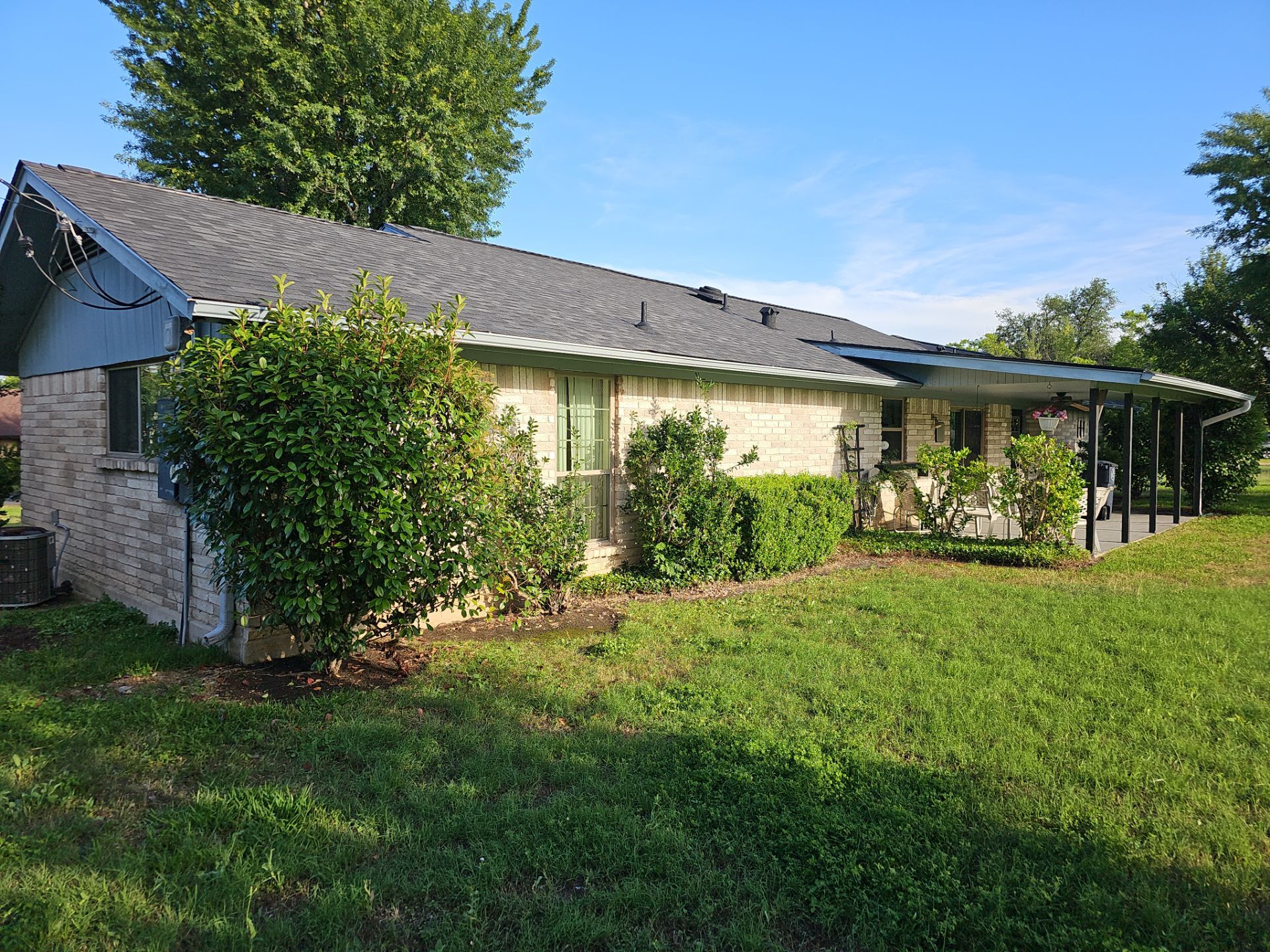 Residential Roofing Installation using Owens Corning Oakridge Onyx Black by DeZign Roofing & Exteriors