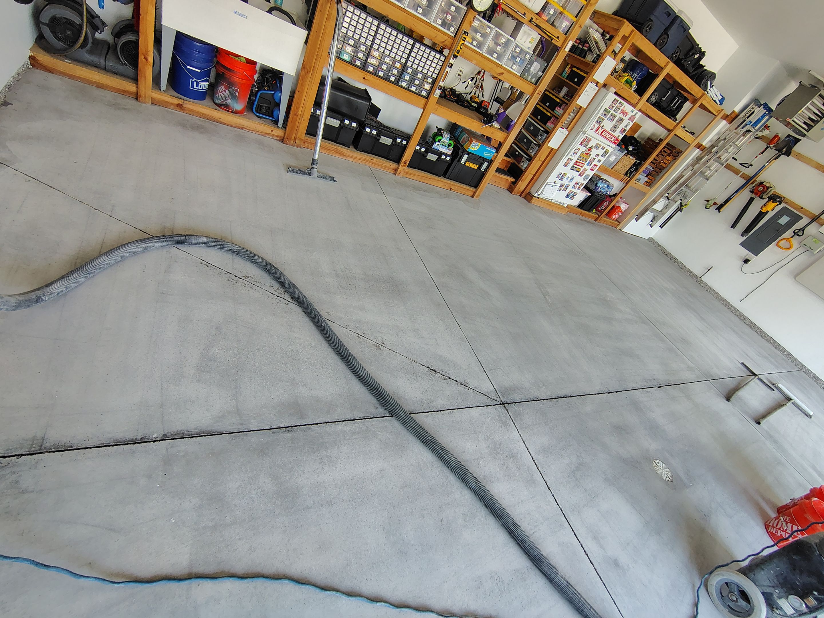 Coyote Garage Floor Coating in Sioux Falls by Select Painting, Coatings & Garage Cabinets