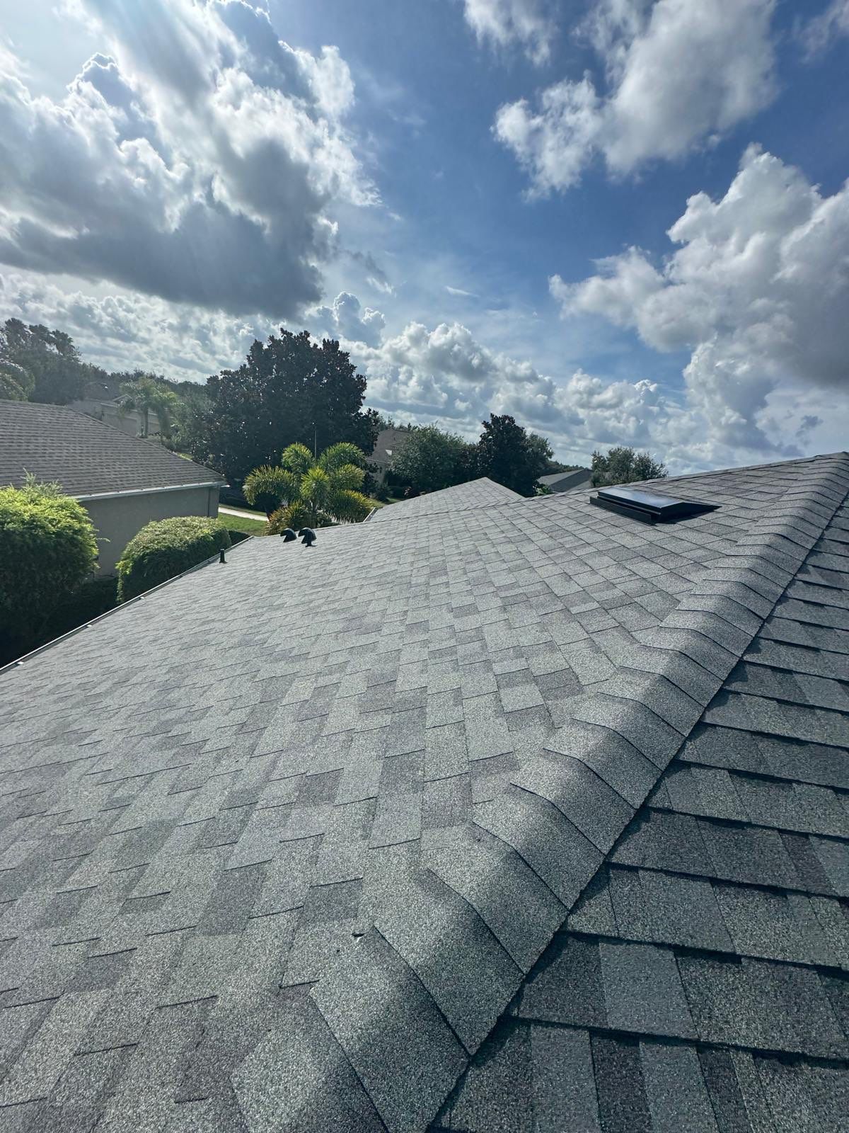 Residential Roof Installation With Estate Grey Architectural Shingles in Bradenton by Trinity Restoration and Roofing LLC