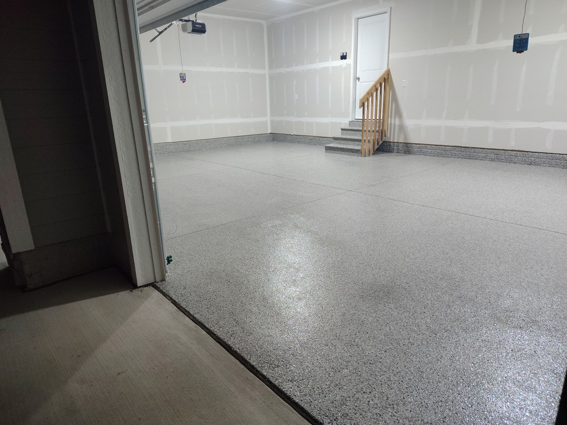 Adel, IA Garage: Complete Keystone Wrap on Floors, Stairs, and Stem Walls by Revival Concrete Coatings