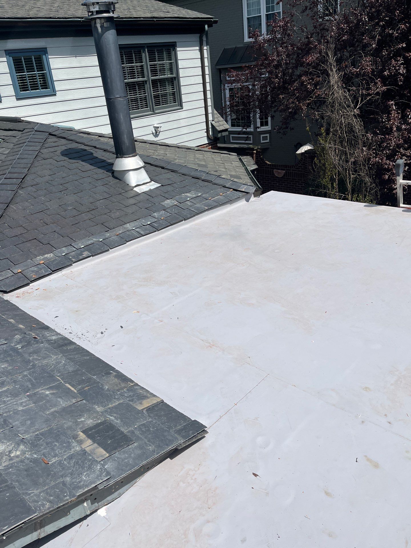 Arlington: Buckingham Slate and Carlisle Syntec TPO Roof by RM Banning, Inc.