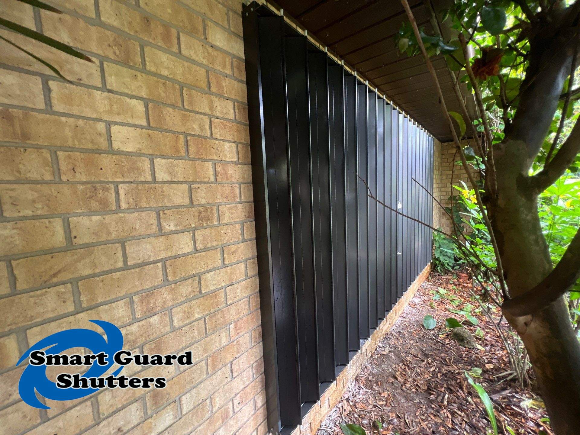 Accordions in Bronze by Smart Guard Shutters