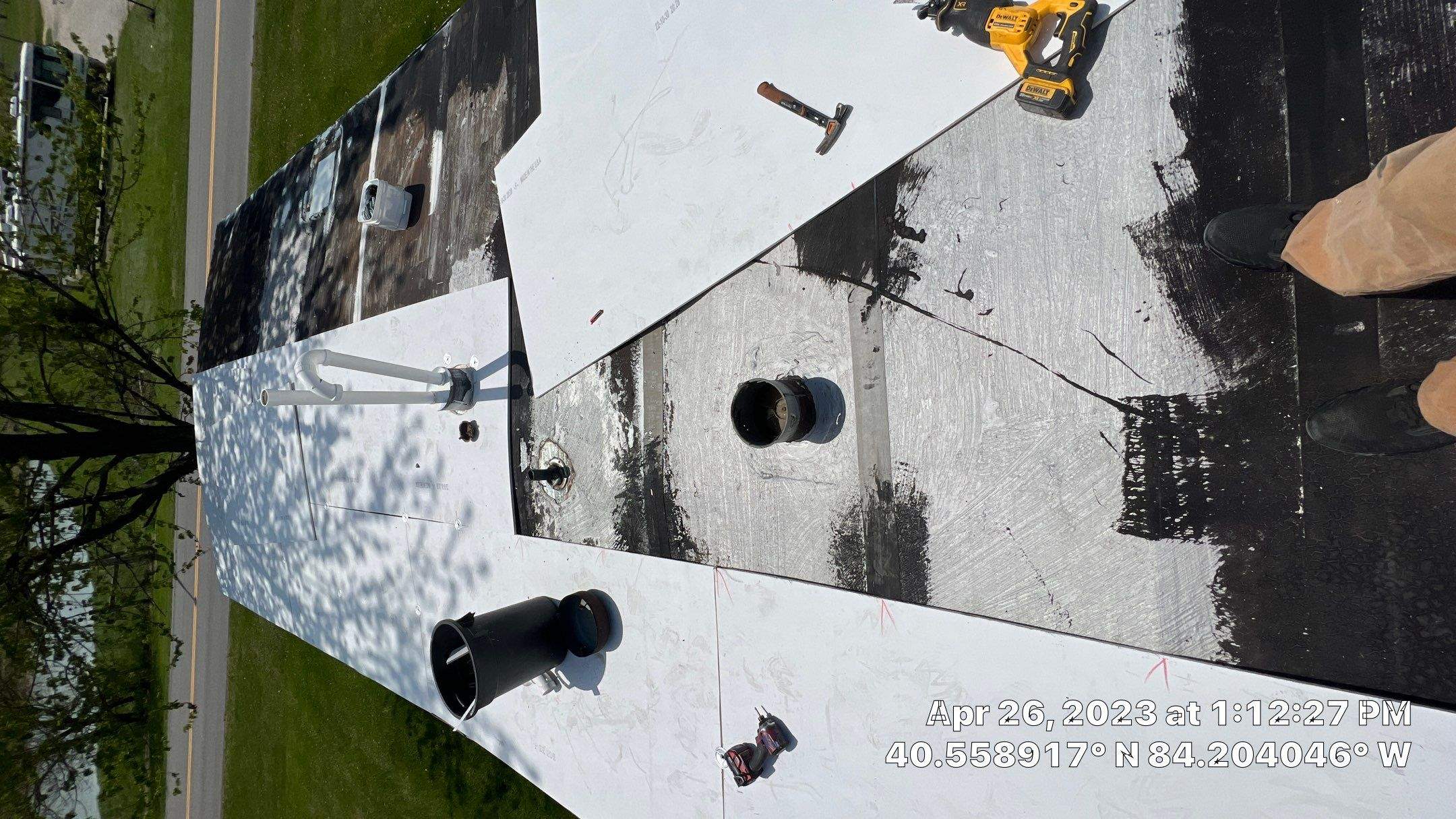 Residential Roofing Installation using 60 mil rubber roof  by Nitro Roofing and Construction