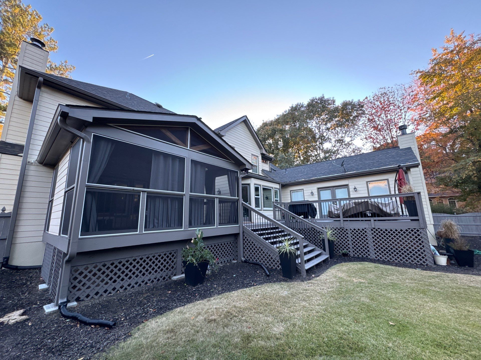 Custom Multi-Level Composite Deck and Screened-In Porch in Marietta by Swift Home Renovations