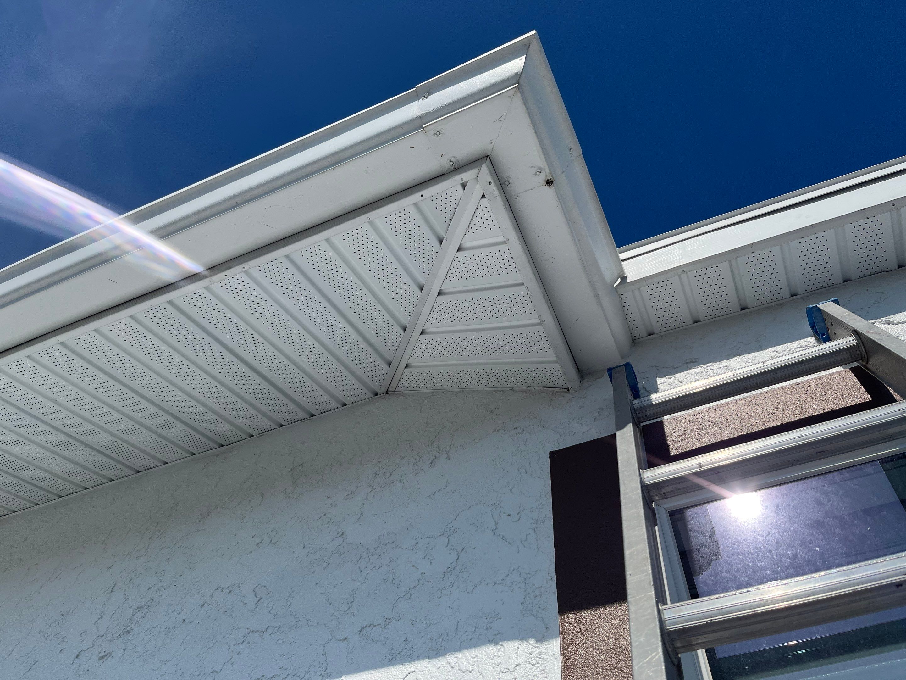 Repainting and Upgrading Gutters in Sarasota FL by Gutter Professors