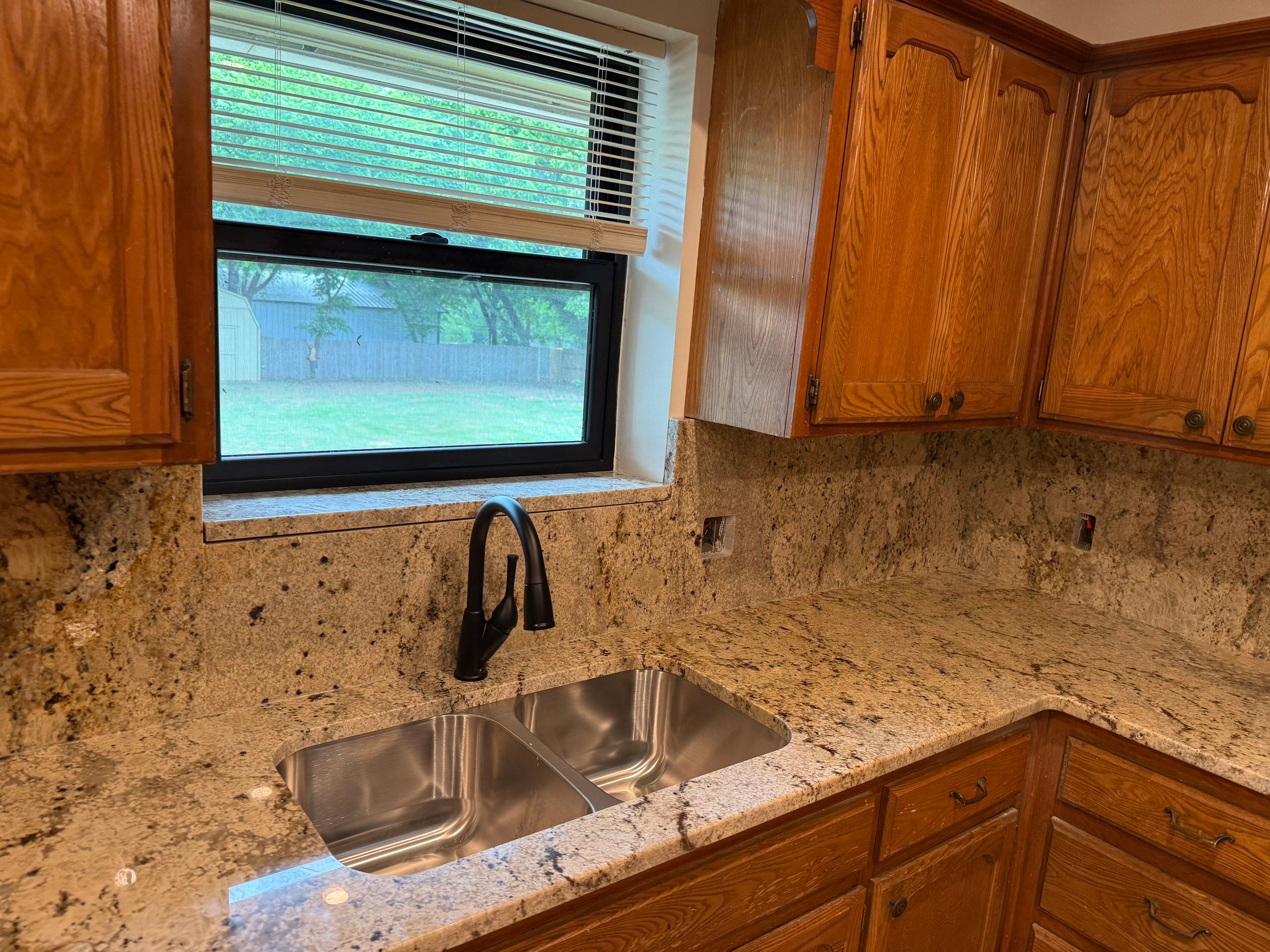 Granite Countertop and Full-Height Backsplash Installation in Washington by TNT Countertops