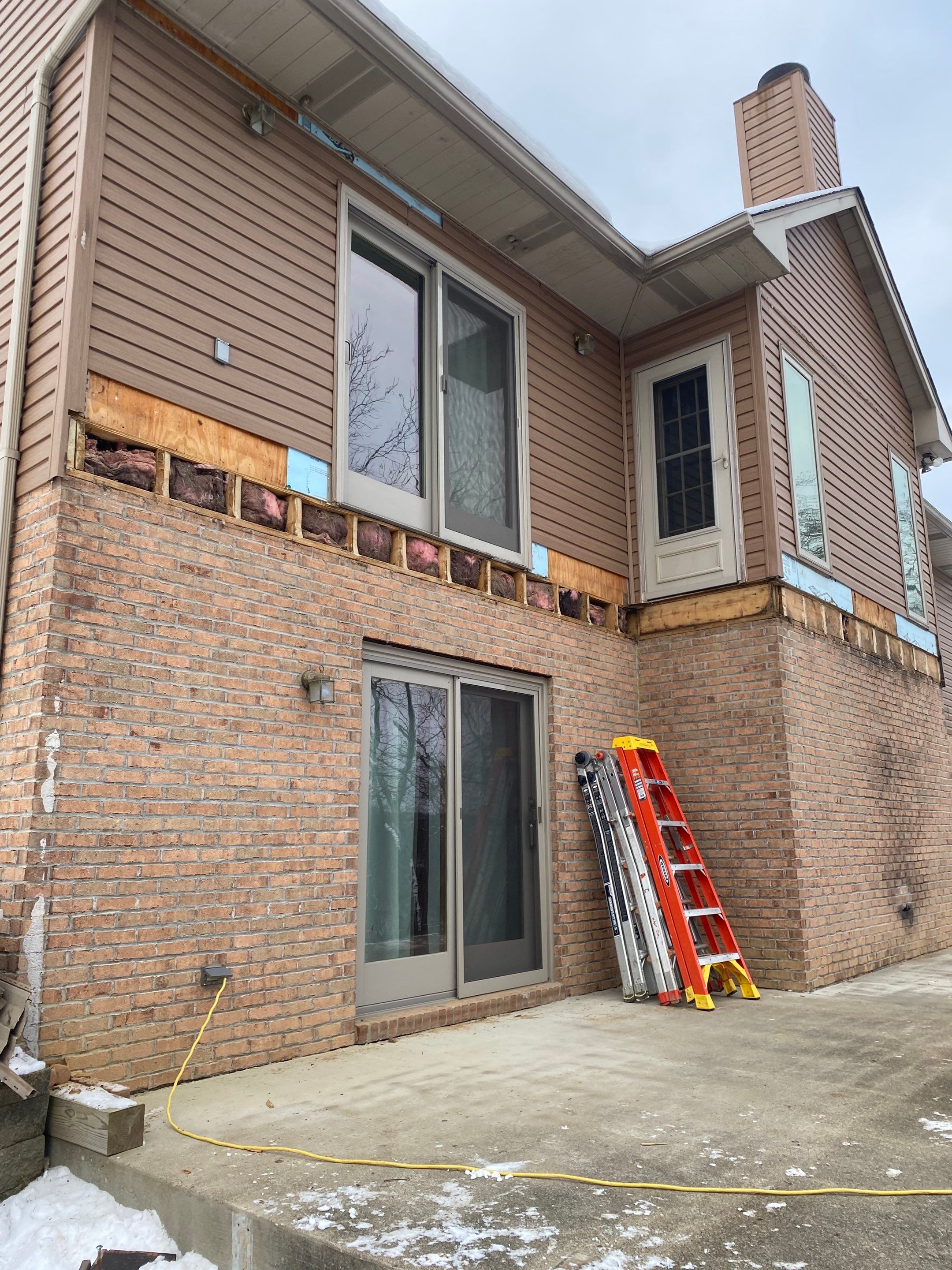 Deck and Roof Build by Cousins Roofing Siding & Decks