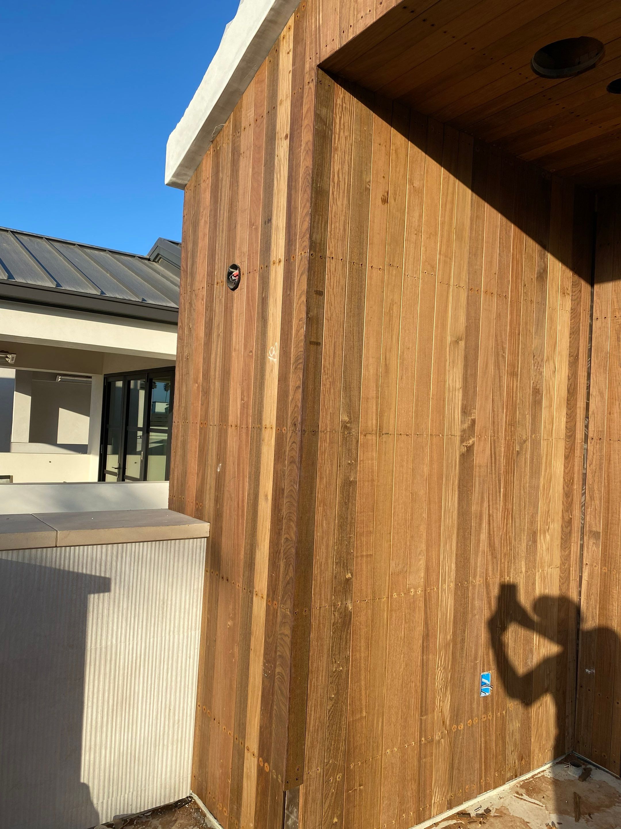 IPE vertical installation by New Era Siding Inc 