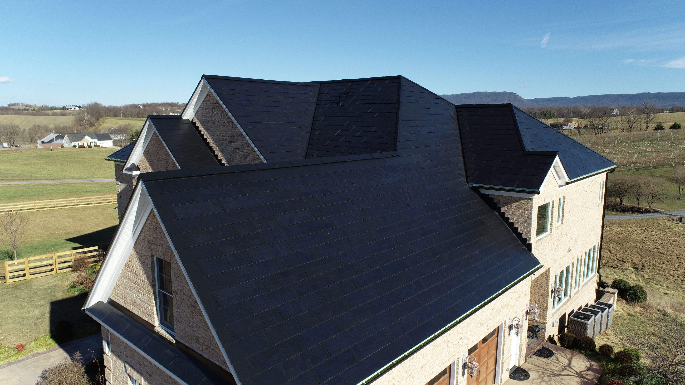 Tesla Solar Roof Replacement by American Home Contractors