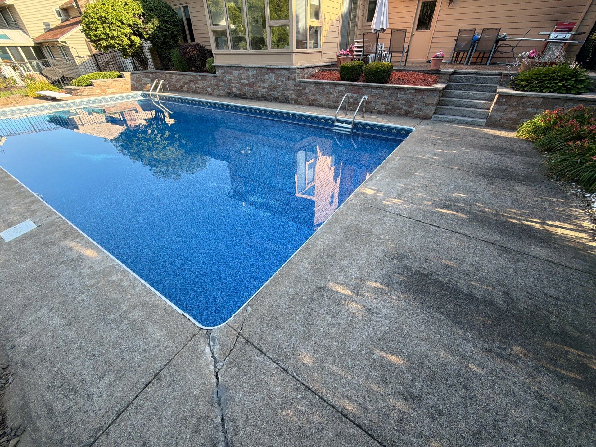 Vintage Shalestone Pool Deck by NG Masonry & Construction LLC