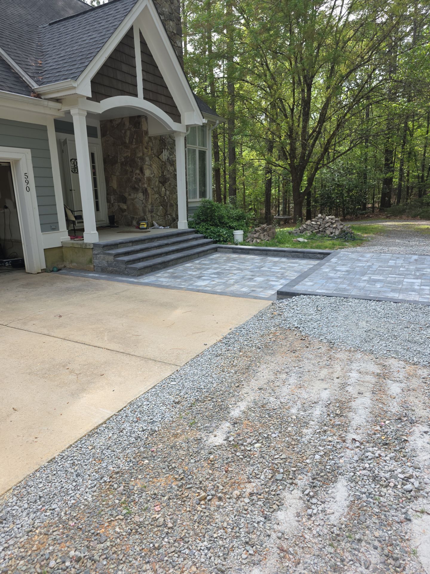 Pittsboro Outdoor Living Transformation – Retaining Wall, Paver Patio & Elevated Deck by Elite Remodeling and Design LLC