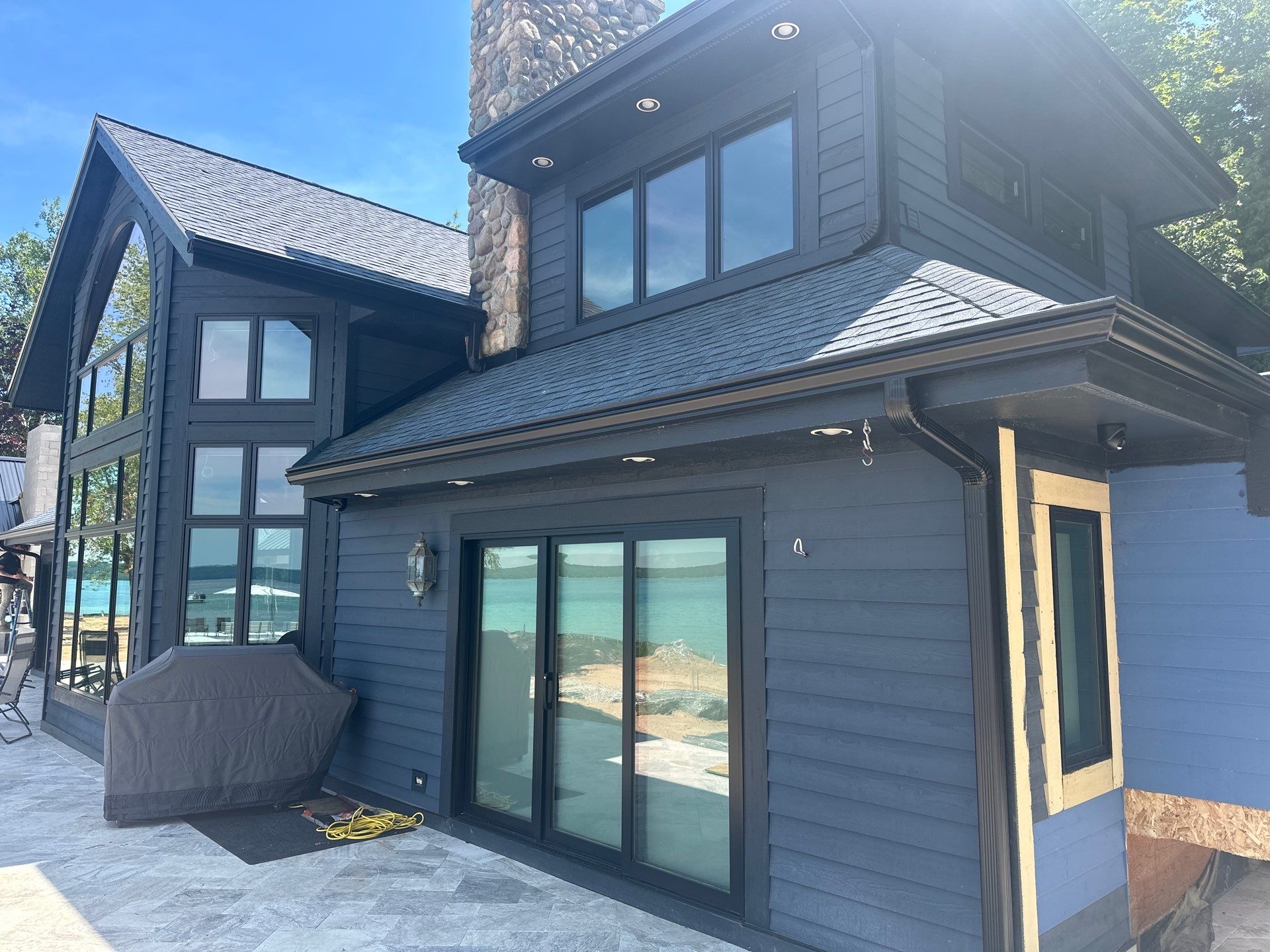 Gutter and Gutter Helmet Installation for Kewadin Residence by Rainbow Seamless Systems