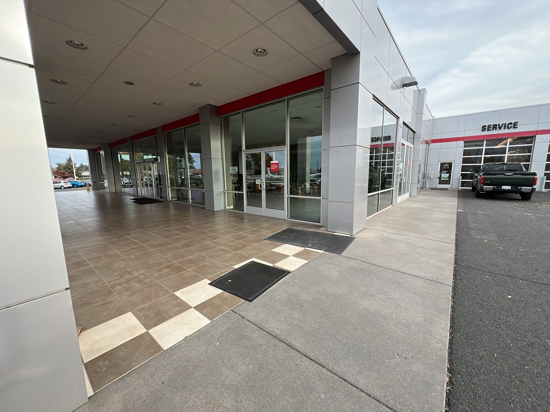 Commercial Floor Transformation using Domino w/ 5% Cherry Bomb Red  by Croc Coatings, LLC