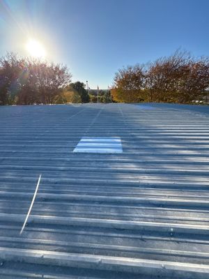 Wide angle view of a clean ribbed metal roof