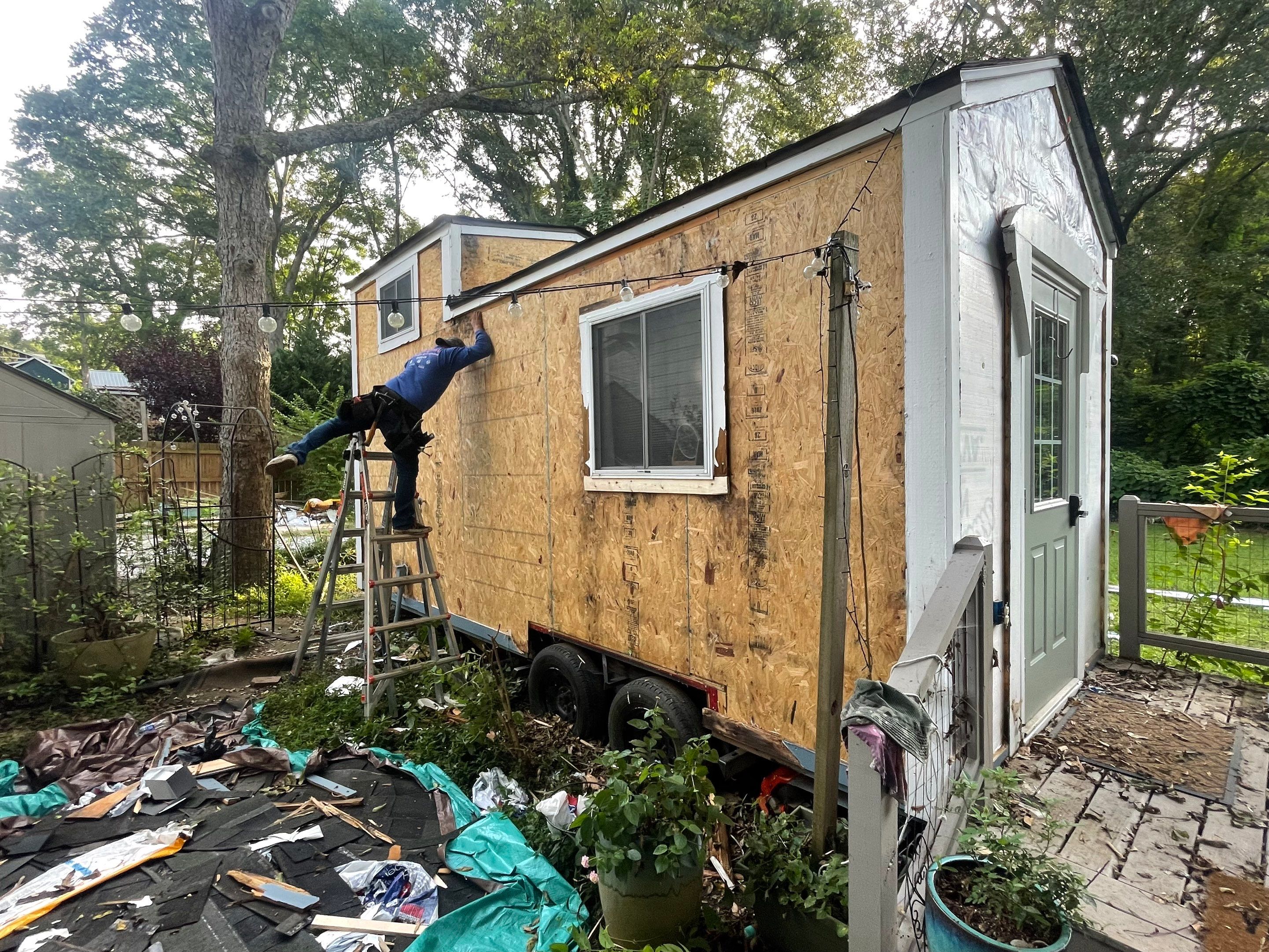 tiny home remodel- siding,paint,roofing by Nailed It Roofing & Remodeling LLC
