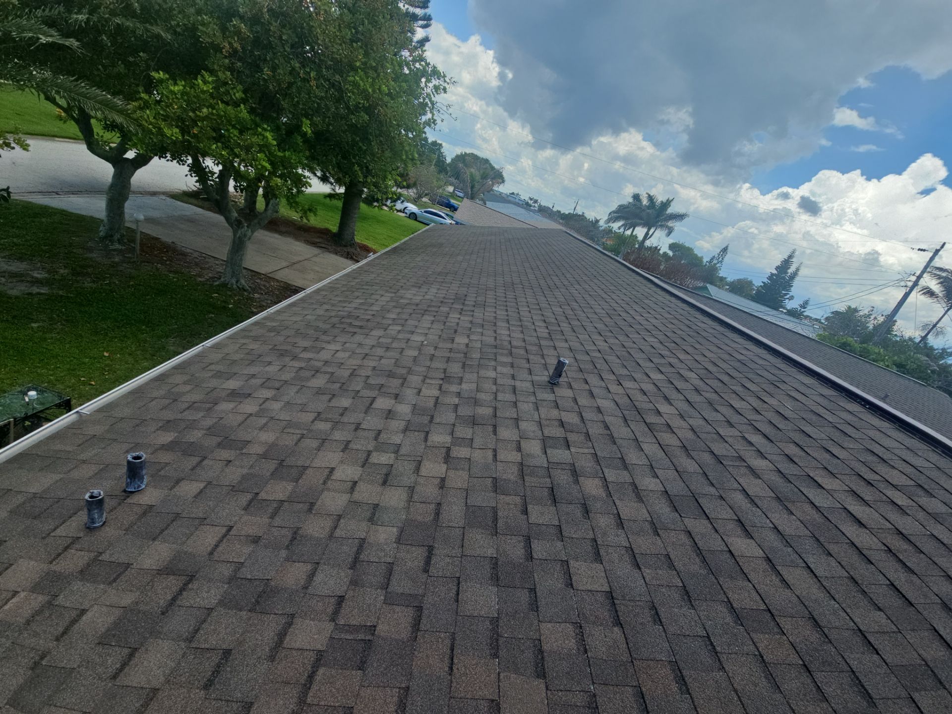 Architectural Shingle Roof Replacement and Deck Repair in Cocoa Beach by Wiedmann Construction & Roofing